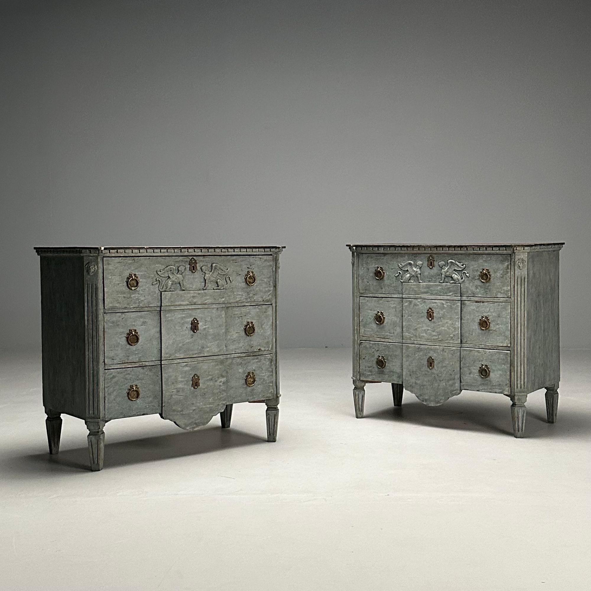 Gustavian, Swedish Commodes, Blue Paint Distressed, Brass, Sweden, 19th C.

Pair of Gustavian style blue distressed painted commodes or dressers designed and produced in Sweden in the later half of the 19th century. Each cabinet having three
