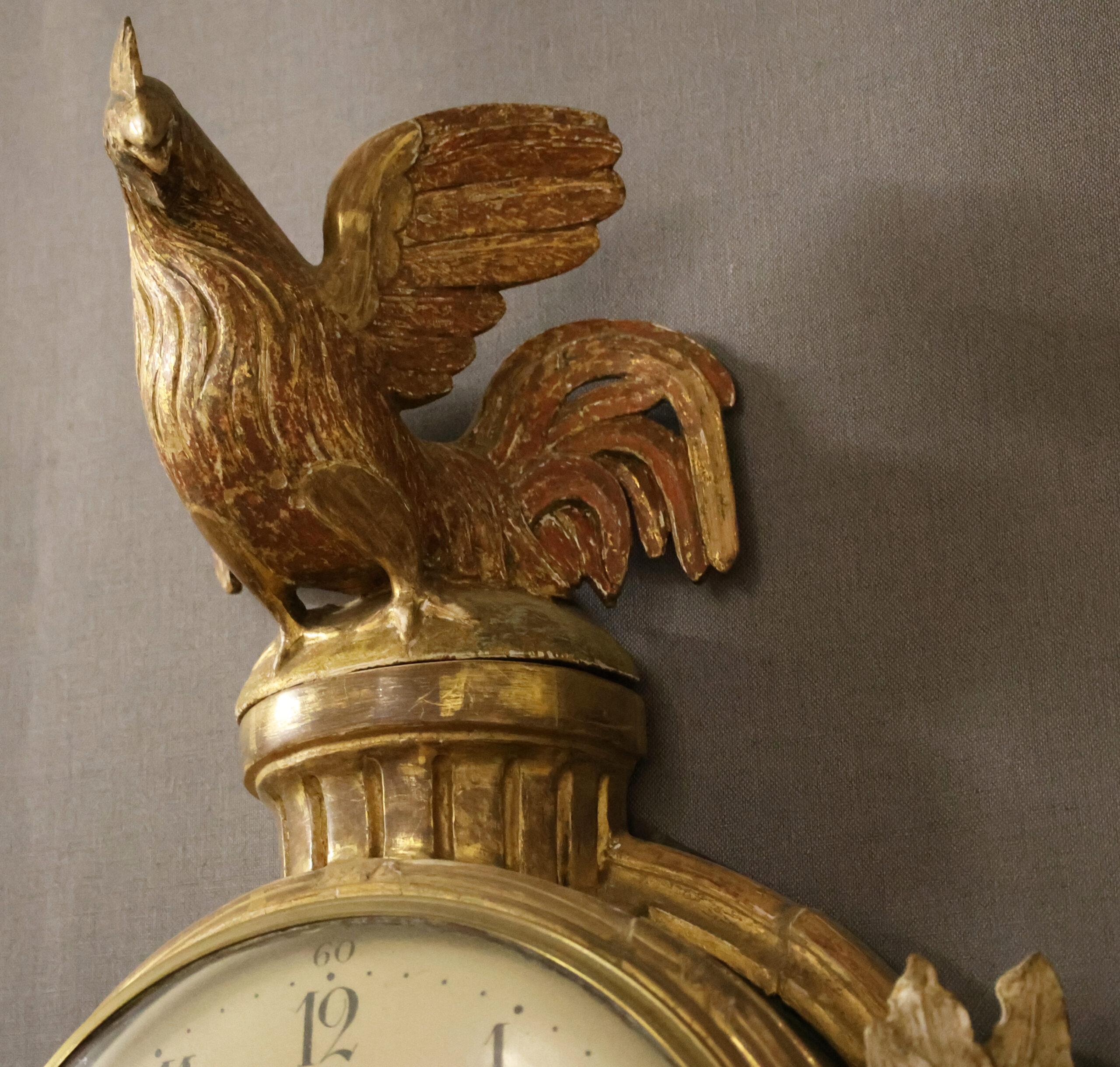 Large Gustavian wall clock with a movement signed by Jacob Kock (1737-1805). He was a court clockmaker in Stockholm and supplied clocks to the court of King Gustav III. This pendulum features a spectacular design, crowned with a rooster at the top.