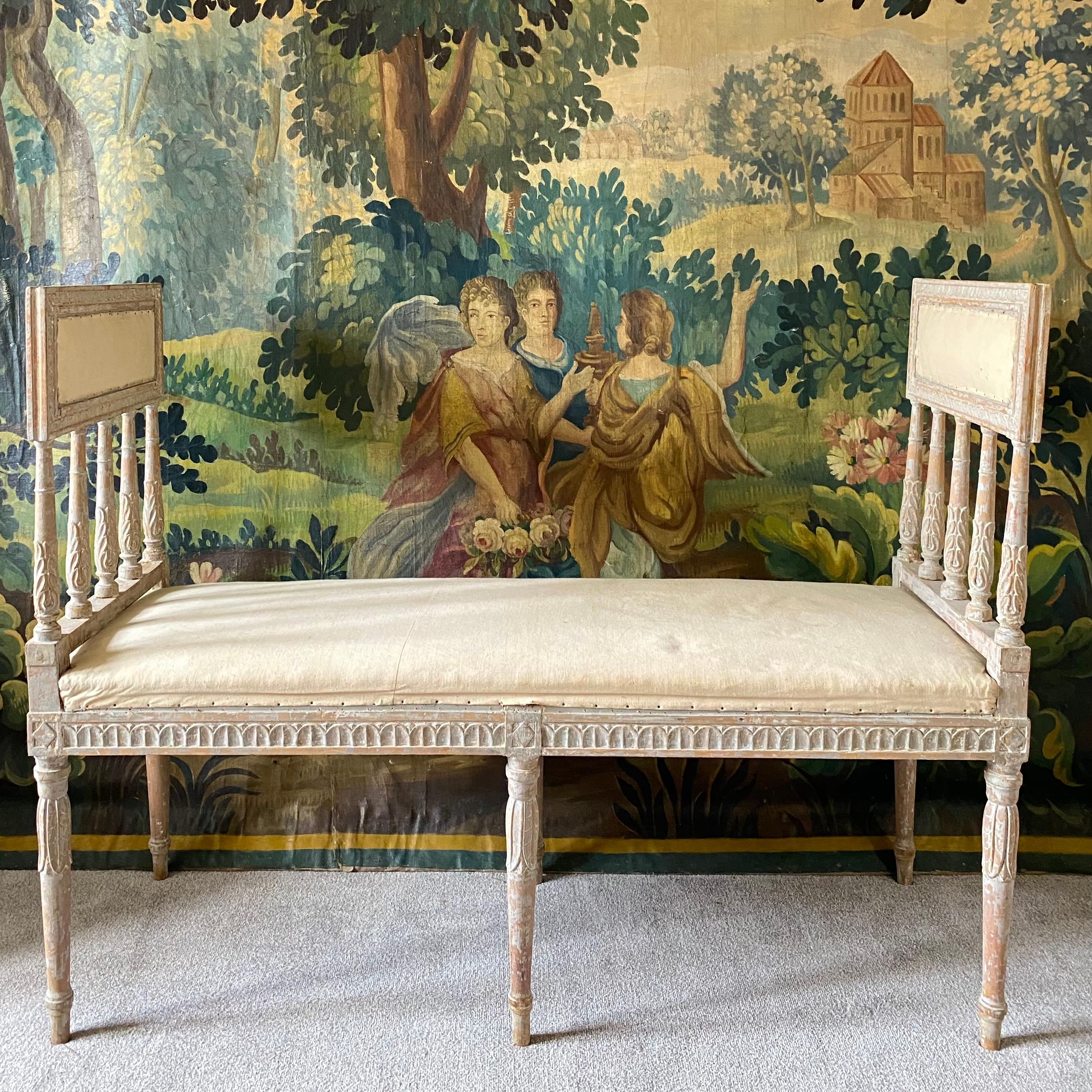 A very beautiful Swedish period gustavian window seat - window seats are differentiated by stools and benches because they are carved on all four sides - and are quite rare 
This example is in original pale blue paint with fine hand carved details -