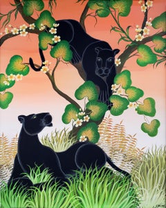 Black Panthers in a tree with a peach sky