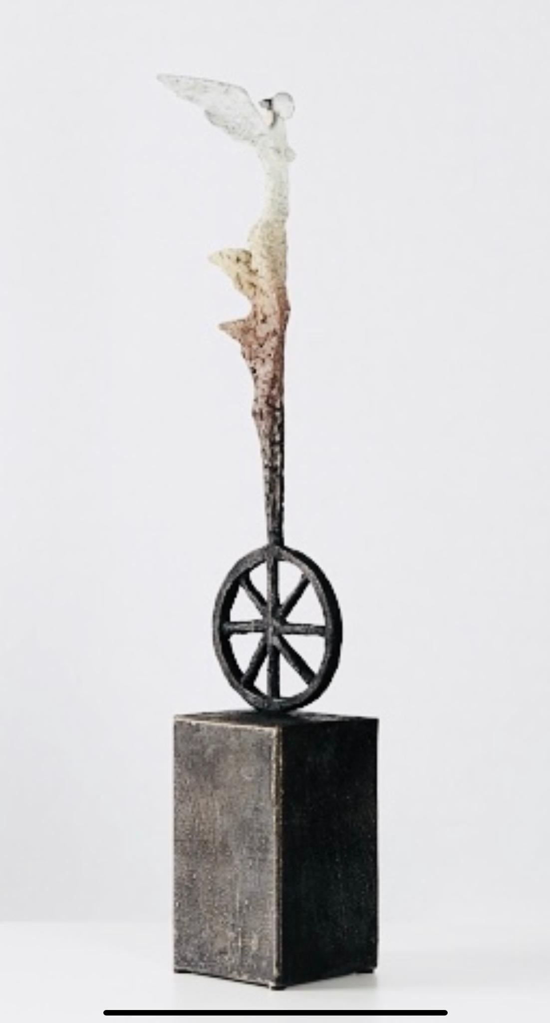 Gustavo Torres Figurative Sculpture - Angel on Wheel.