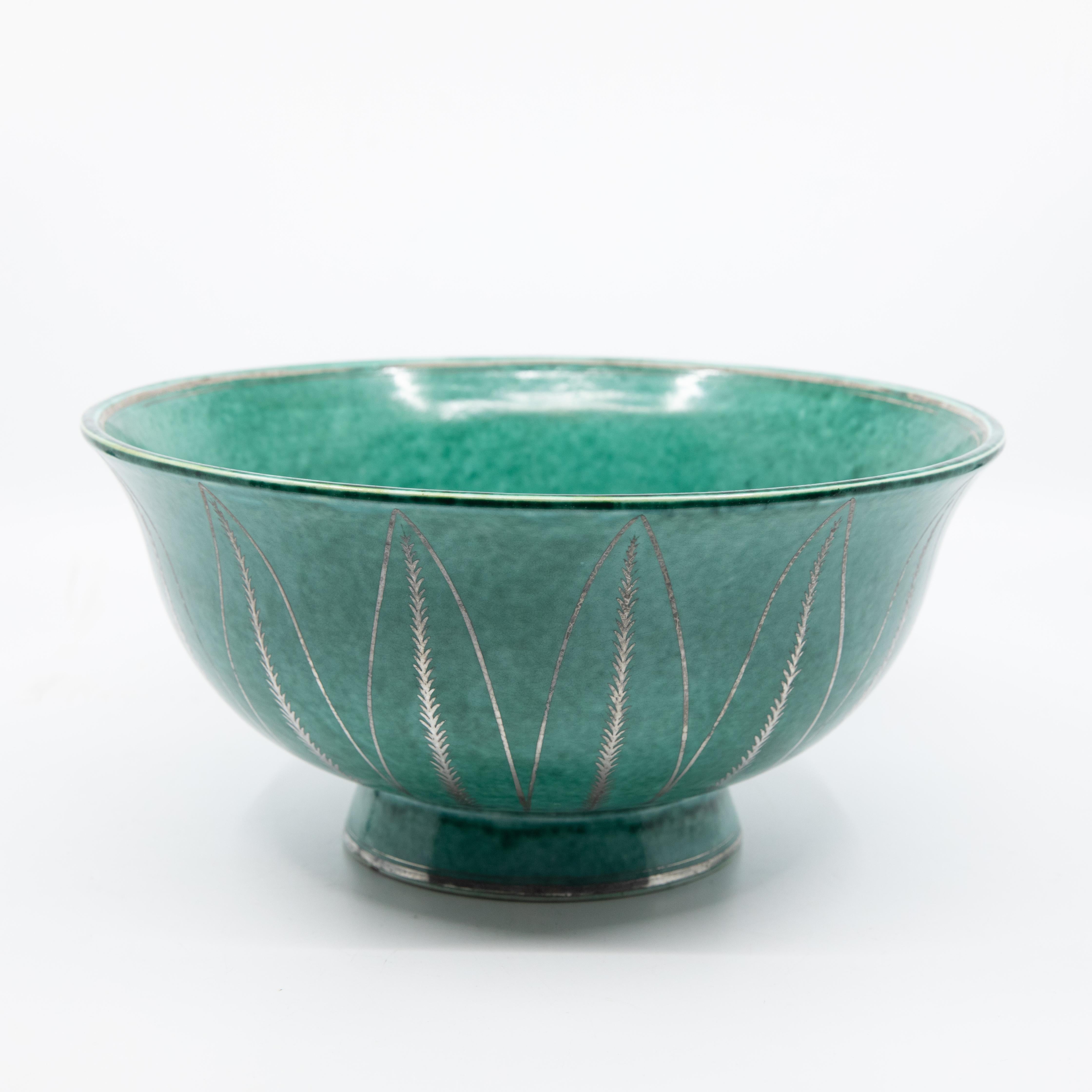 Gustavsberg kage signed argenta fruit bowl with geometric designs, circa 1935. The Argenta designs at Gustavsberg date to the 1930s and were created under the direction of Wilhelm Kage. In 1930, Kåge exhibited his Argenta series at the Stockholm