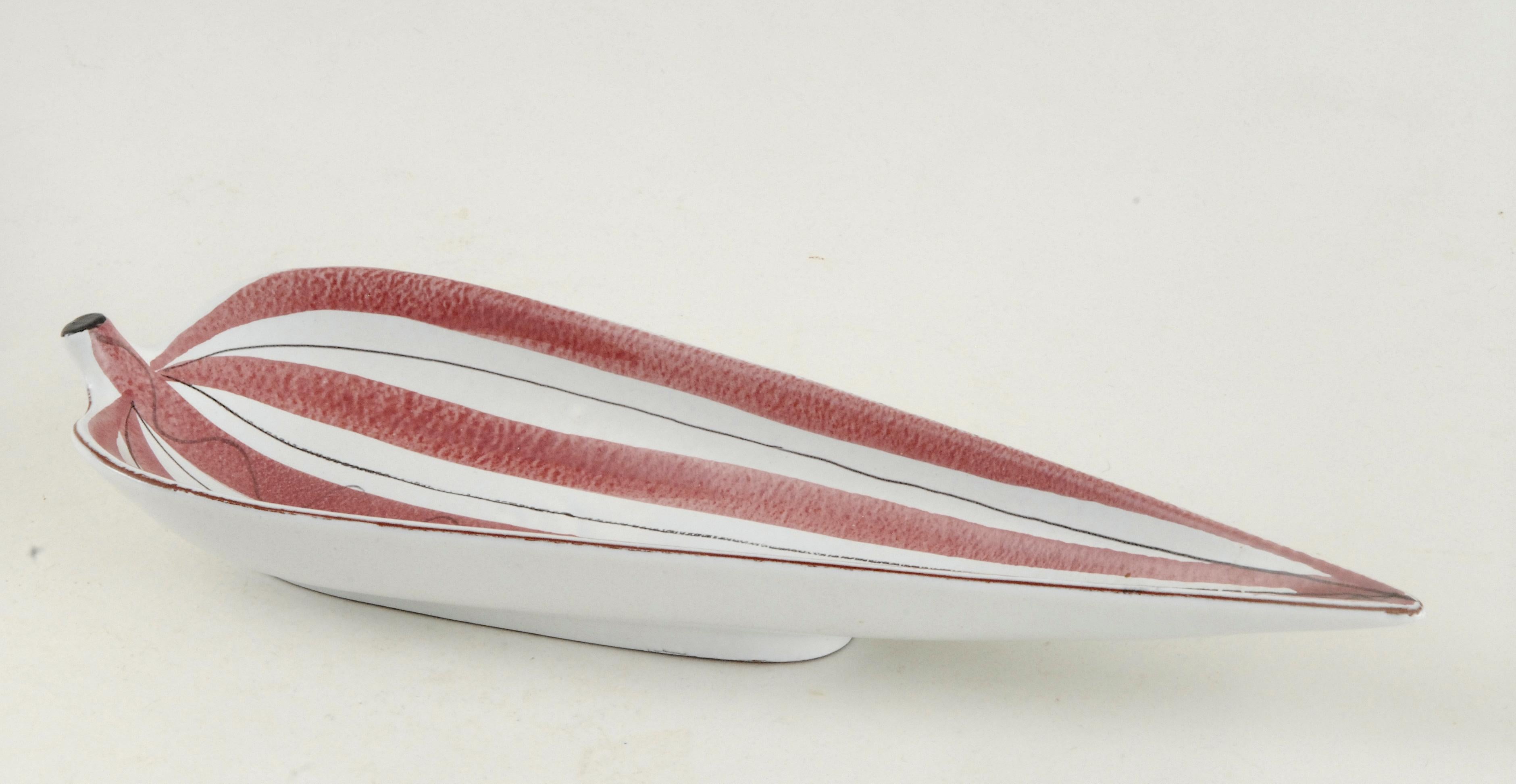 Stig Lindberg timeless design of a leaf dish for Gustavsberg painted in lovely soft maroon tones with a flawless semi matte glaze, fully signed to the bottom, circa 1950.