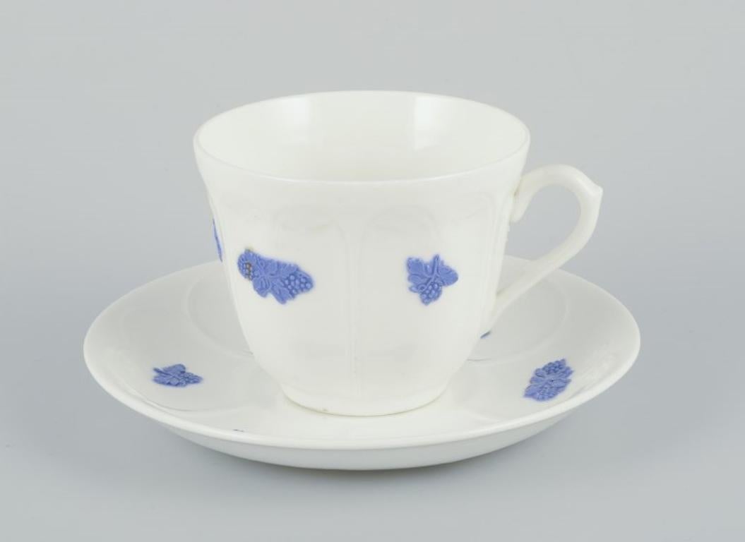 Gustavsberg, Sweden. A set of five large porcelain coffee cups with saucers. 
”Blå Blom” (“Blue Flower”)
Circa 1930s.
Perfect condition.
Marked.
Cup: Height 7.5 cm. x diameter 9.0 cm. without handle 
Saucer: 15.5 cm.

