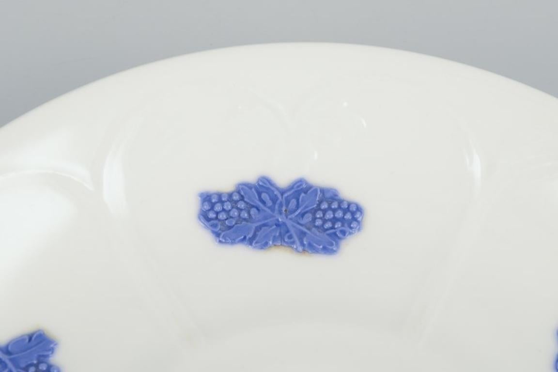 Mid-20th Century Gustavsberg, Sweden. Set of five large porcelain coffee cups with saucers. For Sale