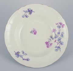 Gustavsberg, Sweden. Set of six deep ‘Geranium’ earthenware plates.