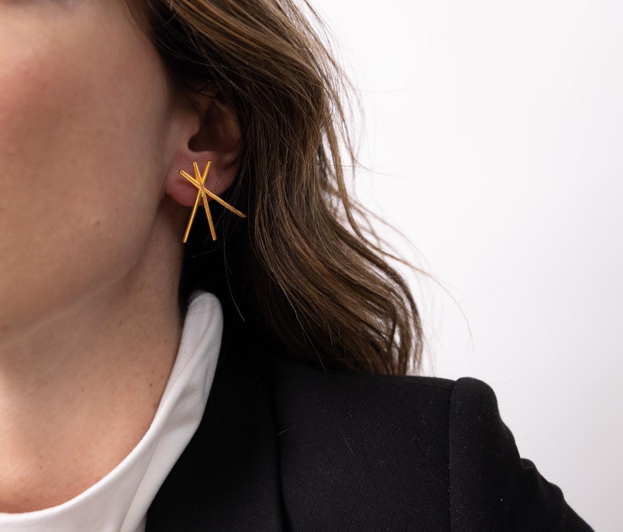 Created in the aftermath of my trip to an open-air ethnographic museum created by Dimitrie Gusti in Bucharest, Romania, these earrings are inspired by the shape of traditional windmills. Windmill holds a lot of symbolism, and not only in its image