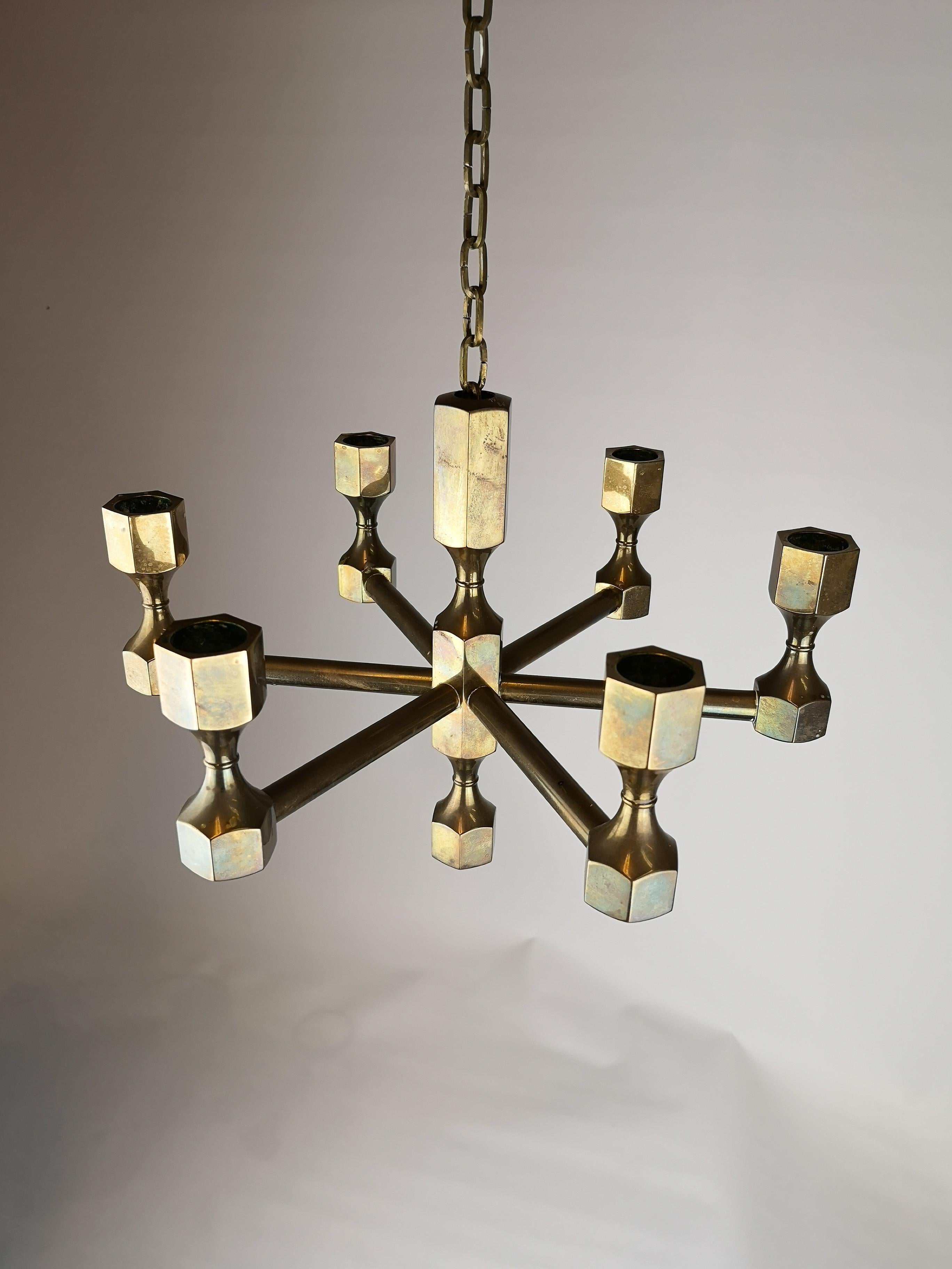 Gusum brass chandelier for six candles. Wonderful in solid brass is this chandelier made in Sweden in the 1970s. In good condition and it is singed on the top of the chandelier.

Measures: 32 cm. x 24 cm.