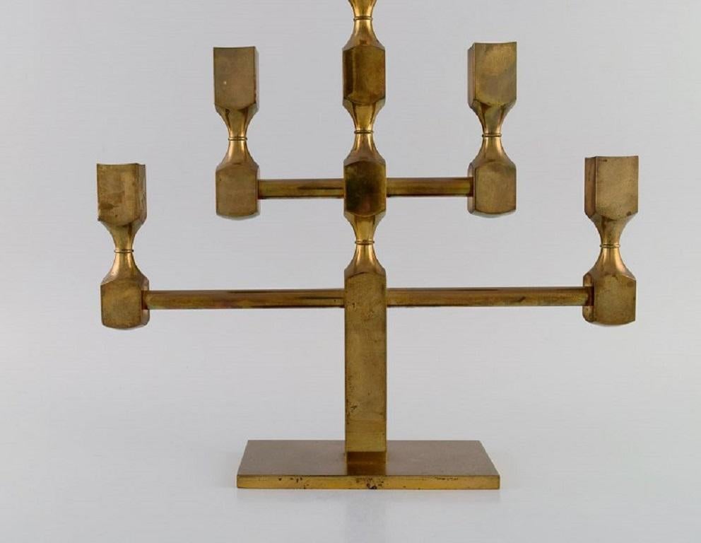 Gusum metal. large five-armed candlestick in brass. Swedish design, 1980s.
Measures: 32 x 32 cm.
In excellent condition.
Stamped.
