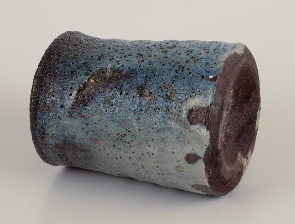 Mid-20th Century Gutte Eriksen, Denmark. Vase in ceramic, raku technique, flowing lava glaze For Sale