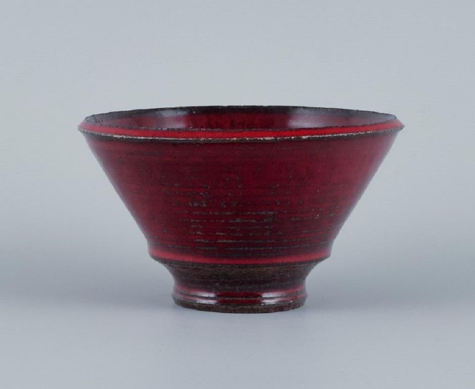 Gutte Eriksen for Kähler, ceramic bowl with glaze in burgundy tones.
Approx. 1938.
Perfect condition.
Marked.
Dimensions: D 13.0 x H 8.0 cm.