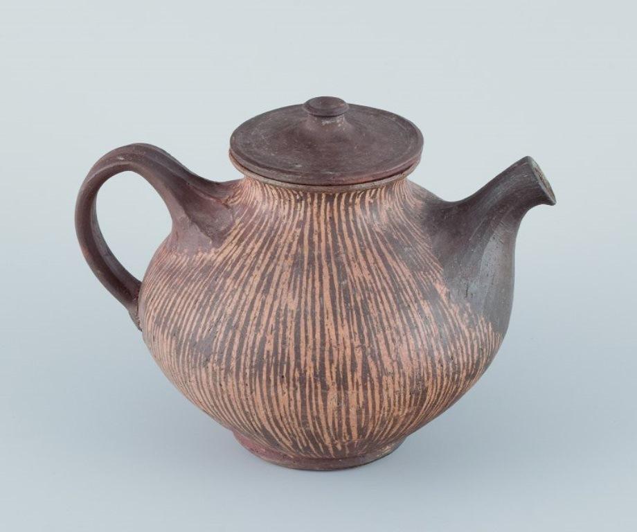 Scandinavian Modern Gutte Eriksen, own studio, Denmark. Unique ceramic teapot. Raku-fire technique For Sale