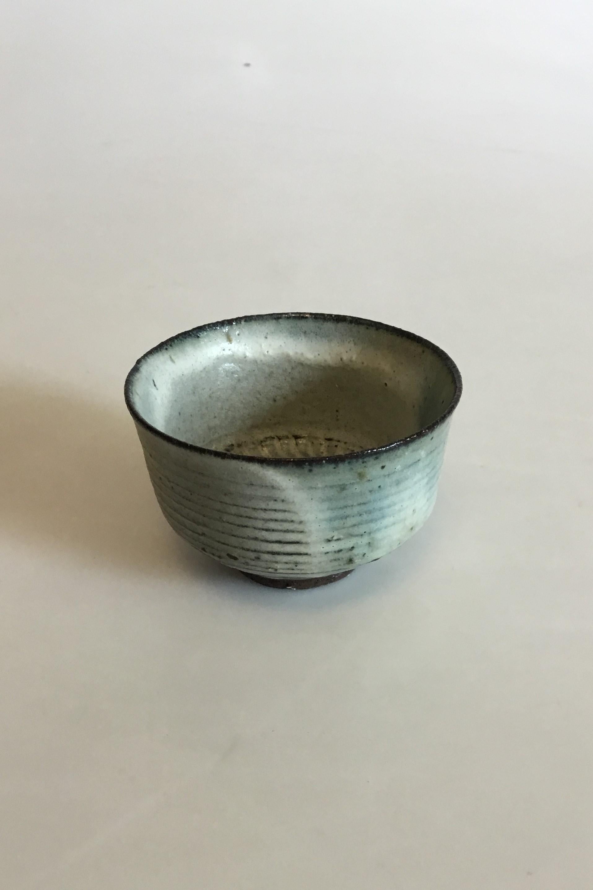Gutte Eriksen small stoneware bowl. Measures: 4.5 cm / 1 49/64 in. x 7 cm / 2 3/4 in. diameter.