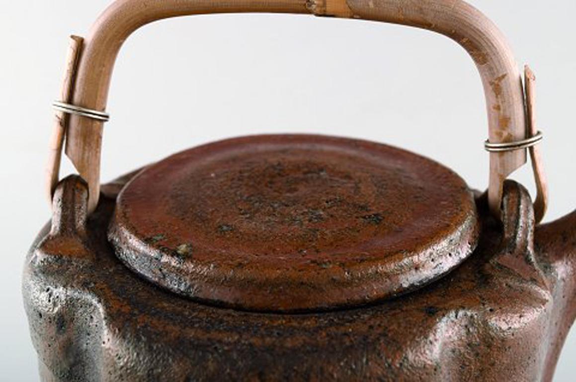 Mid-20th Century Gutte Eriksen, Unique Teapot of Stoneware with Handle in Wicker