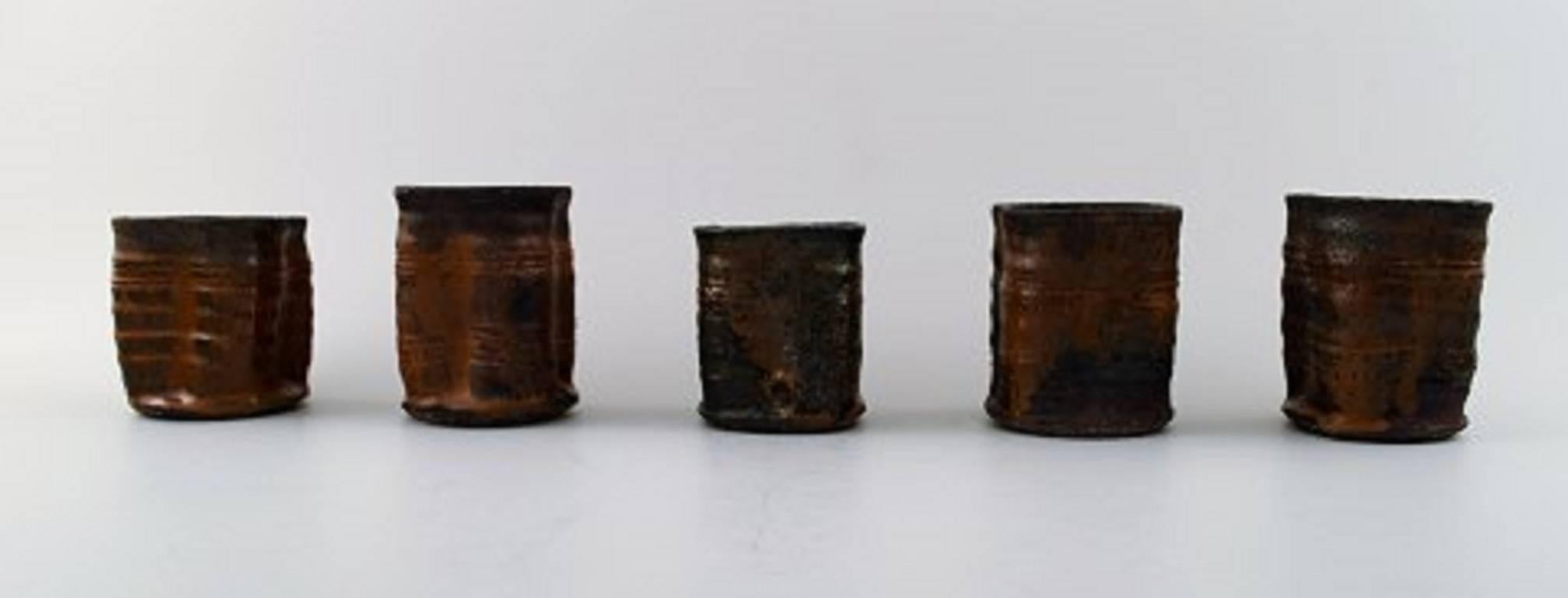 Gutte Eriksen, own workshop, 12 ceramic cups.
1950s.
Stamped.
Measures: 9 x 7 cm.
In perfect condition.