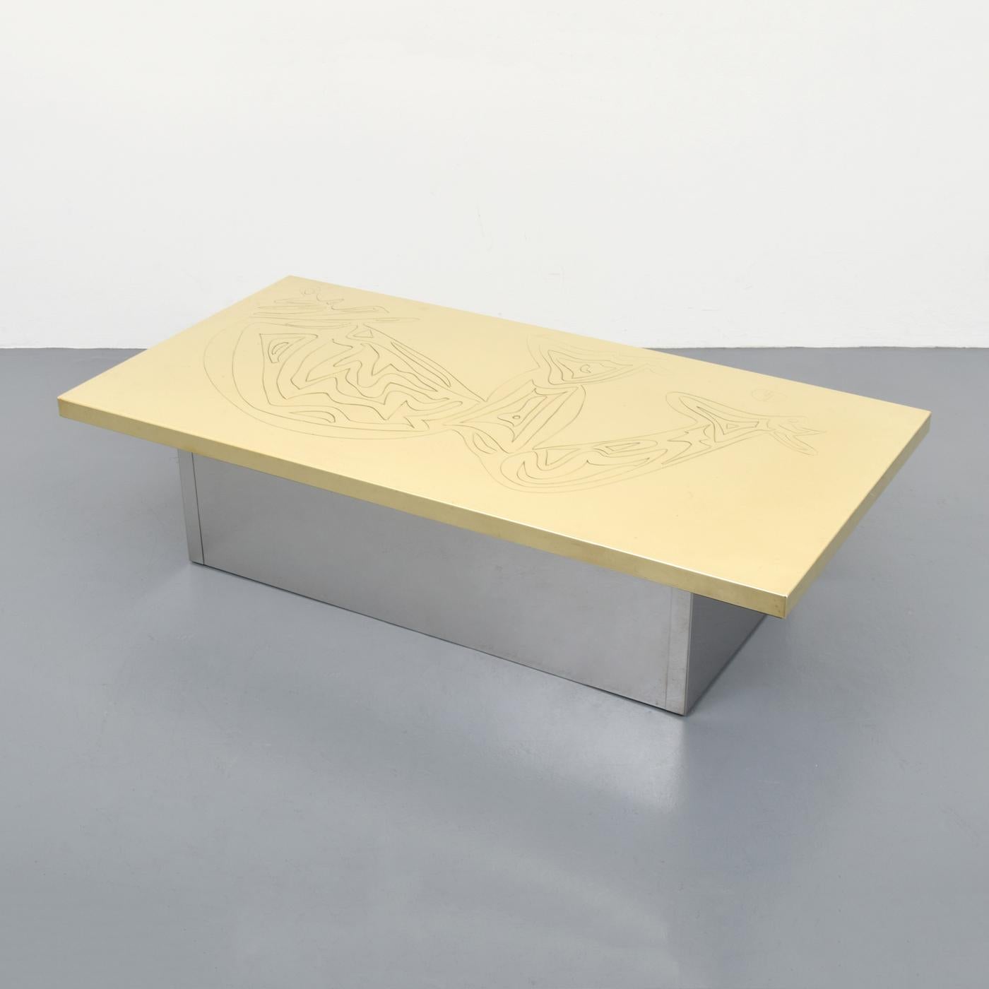 Coffee table by Guy de Jong. Please see our other matching table also listed on 1stdibs.

Materials: etched brass, chrome-plated brass. 