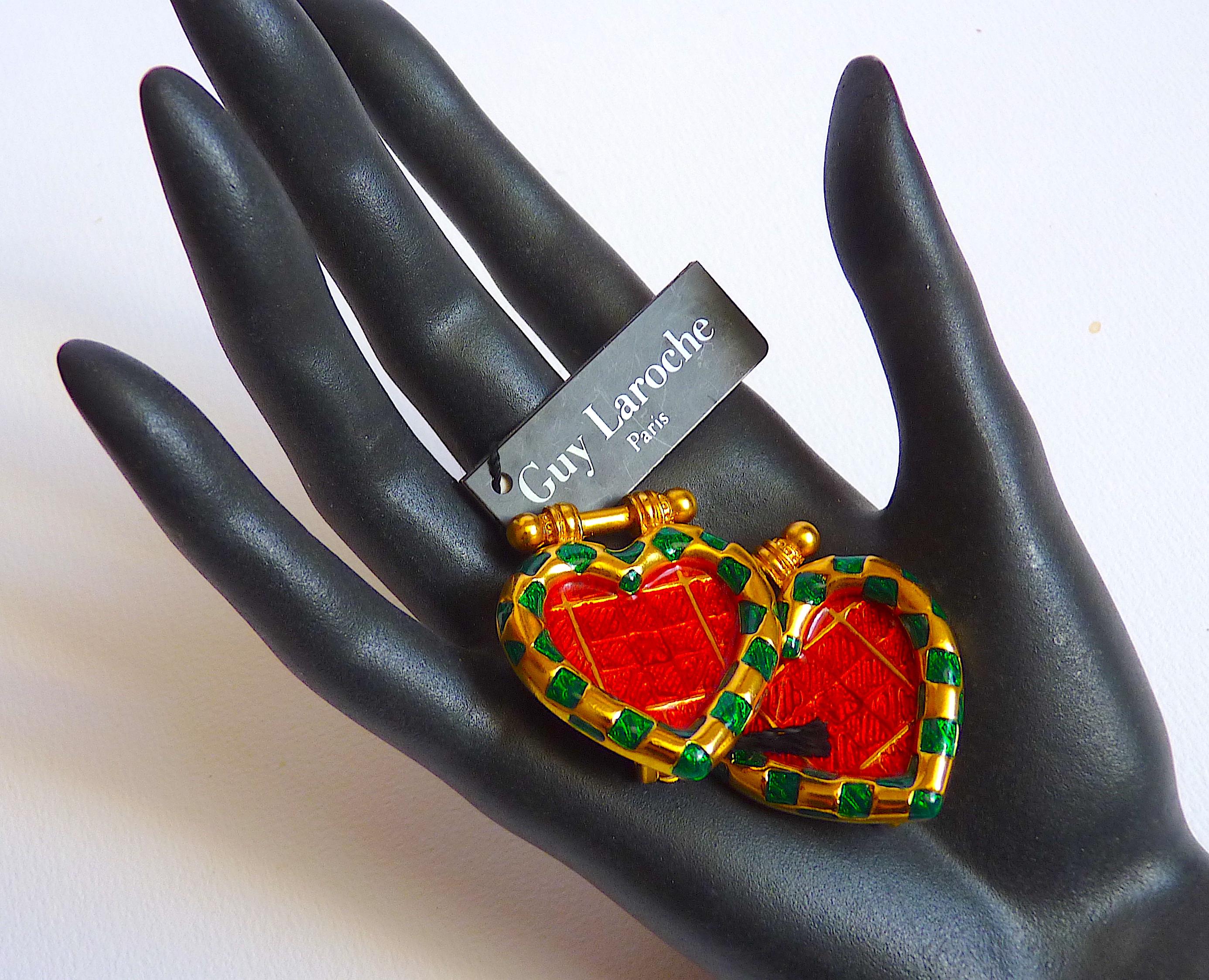 Exquisite GUY LAROCHE PARIS Clip On Earrings, Enameled Metal Heart and Gold Tone Metal, Vintage from the 1980's
Signed GUY LAROCHE PARIS at back

CONDITION : NEW WITH TAG, NEVER WORN, MINT CONDITION

Measurement : around 4 X 3 cm

You will find on