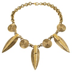 Guy Laroche Collier tribal en métal doré