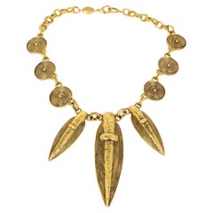 Collana tribale in metallo dorato di Guy Laroche