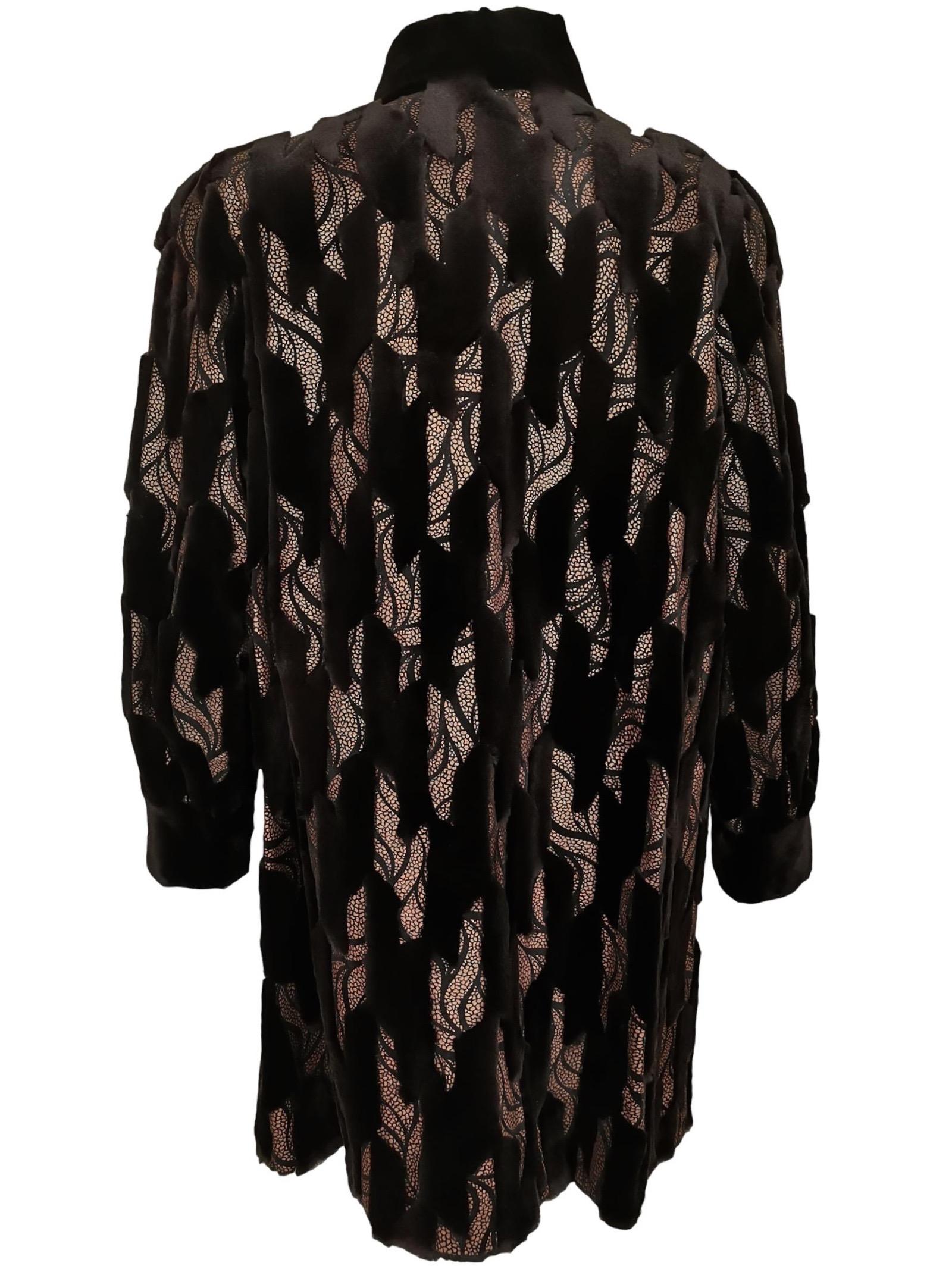 Guy Laroche
Patterned Mink Jacket
Soft and Subtle Texture
No Size Label
40 Inch Bust