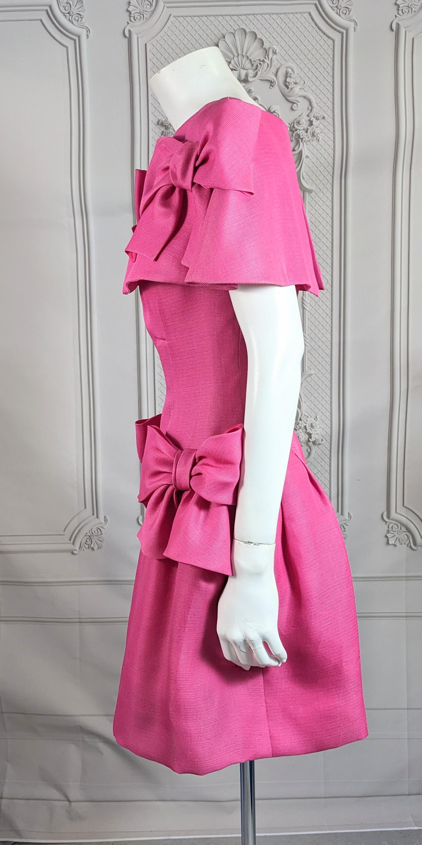 Charming Guy Laroche Hot Pink Silk Gazar Pouf Dress from the 1980's. Slubbed silk gazar is similar to an organza with a striated texture. Charming cocktail pouf shaped skirt from nipped waist with large cape collar and bow detailing. Back zip entry