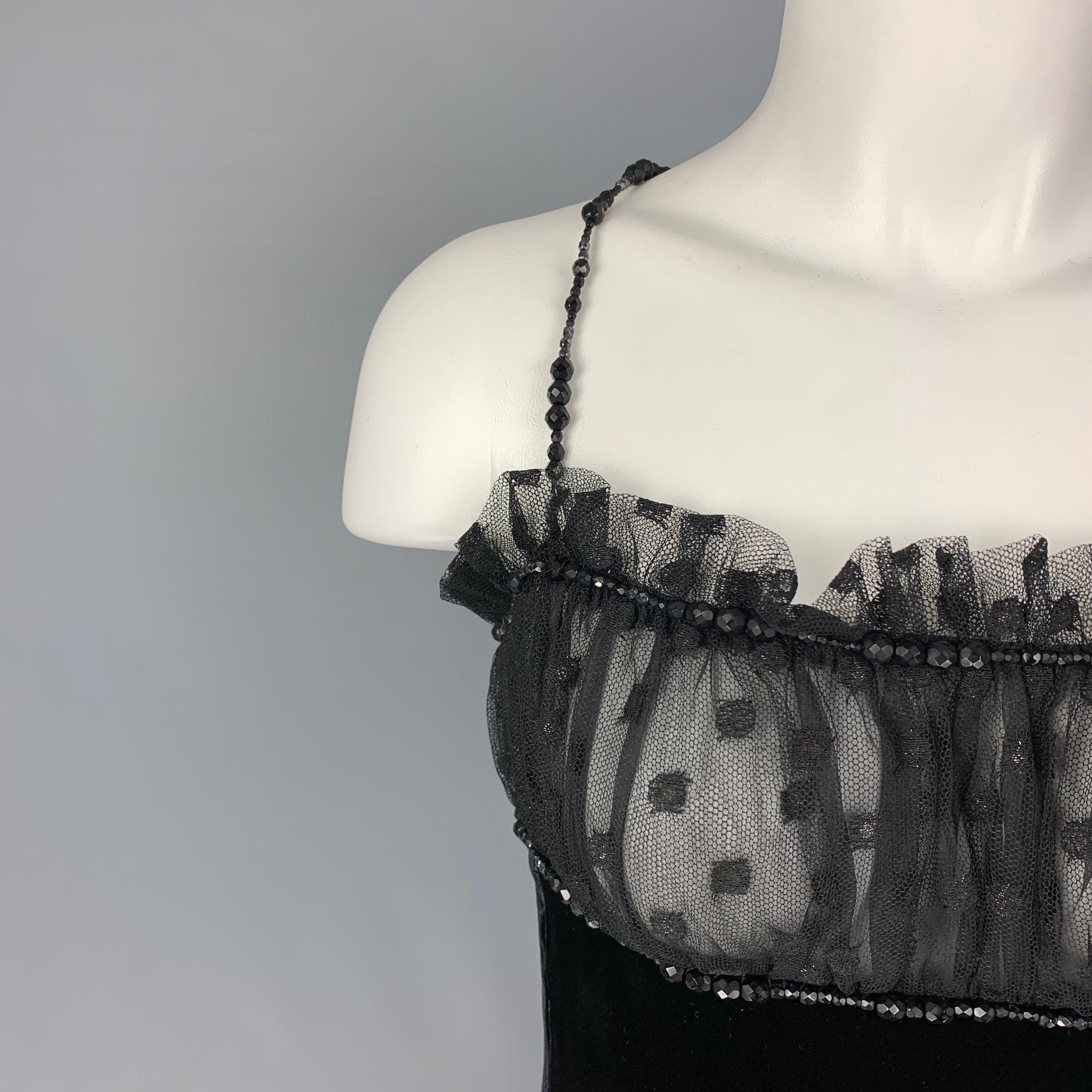GUY LAROCHE dress comes in a black viscose / silk with a slip liner featuring beaded spaghetti straps, lace panel, and a back zipper closure. Made in France.
Very Good
Pre-Owned Condition. 

Marked:  F 42 / USA 10 / GB 14 / D 40 

Measurements: 
