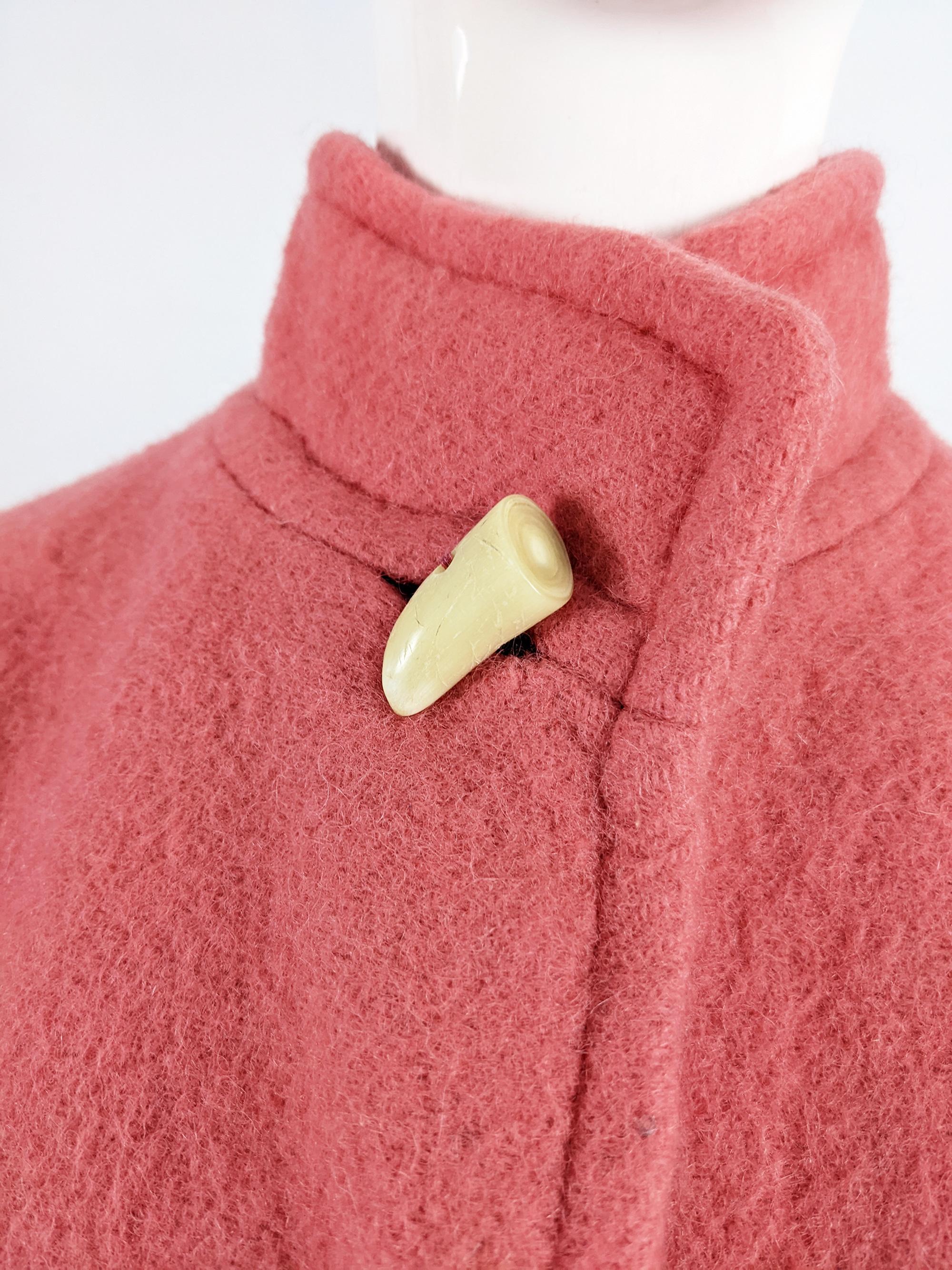 pink cape coat