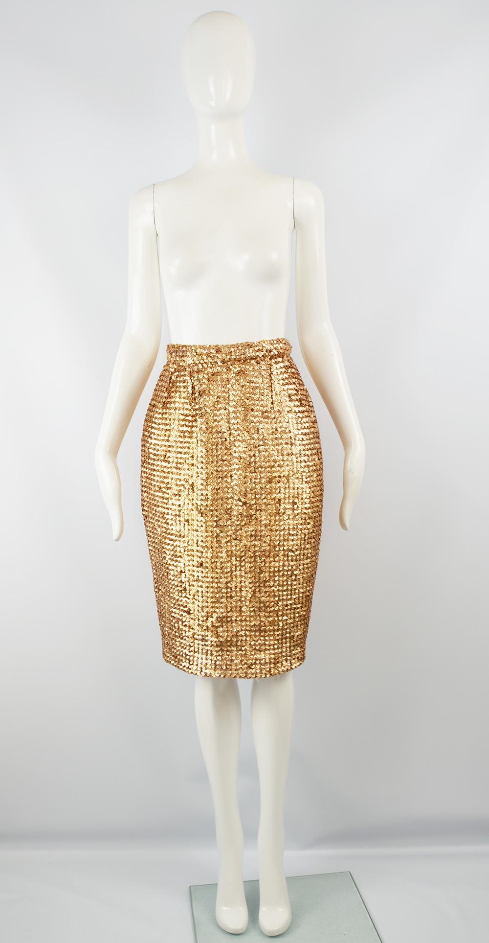 An incredibly chic vintage women's pencil skirt from c.the late 80s by luxury French fashion designer, Guy Laroche. In a knit fabric completely covered in rose gold / bronze sequins and silver lurex thread throughout for a truly glamorous look. 