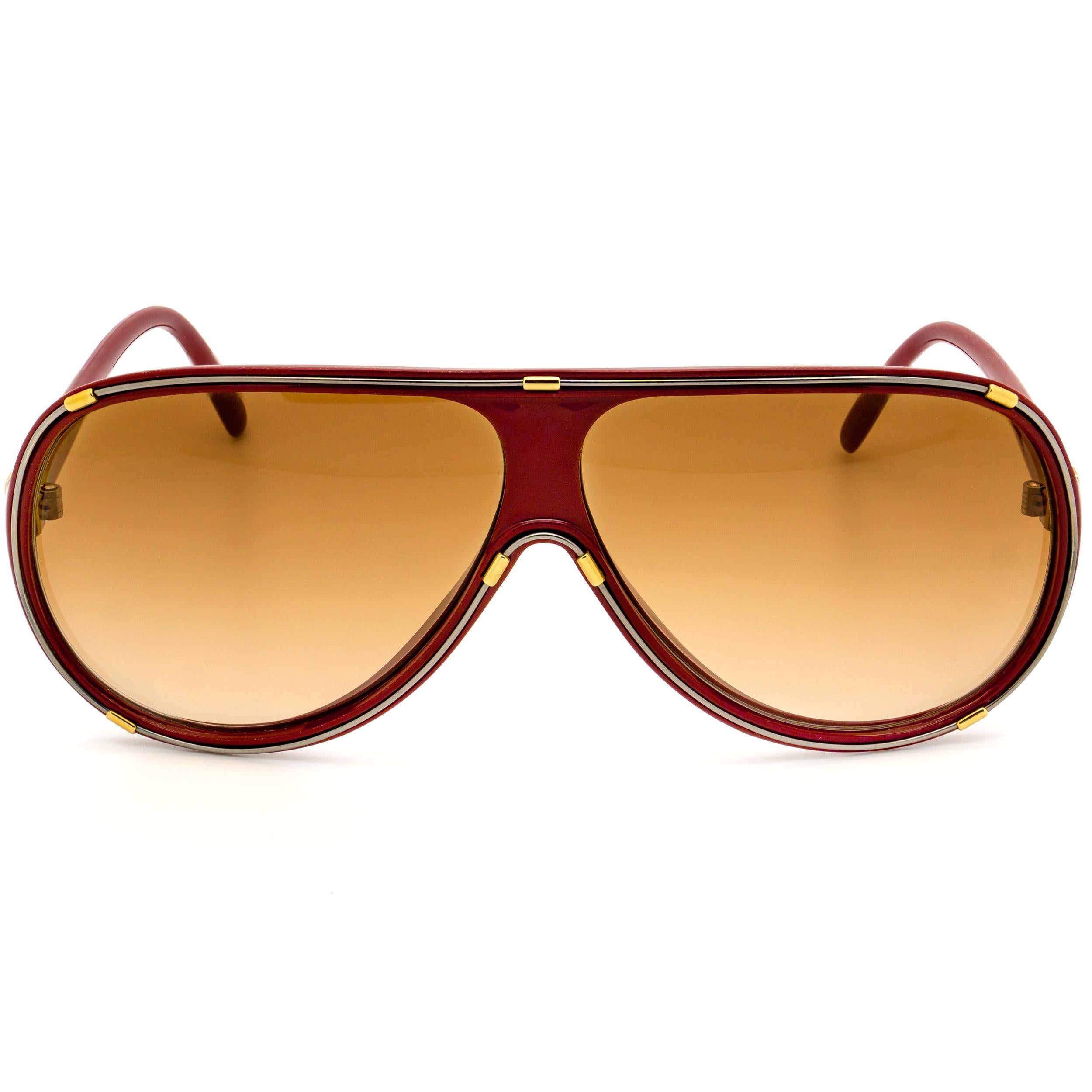 MAKE: Guy Laroche
MODEL: 5125 - Burgundy
MADE IN: France
ERA: 1980s
CONDITION: New Old Stock [never worn]

DIMENSIONS:
Lens width: 61 mm 
Lens height: 54 mm  
Bridge: 10 mm
Temple-to-temple width: 140 mm 

COLORS:
Frame: Burgundy
Lens: