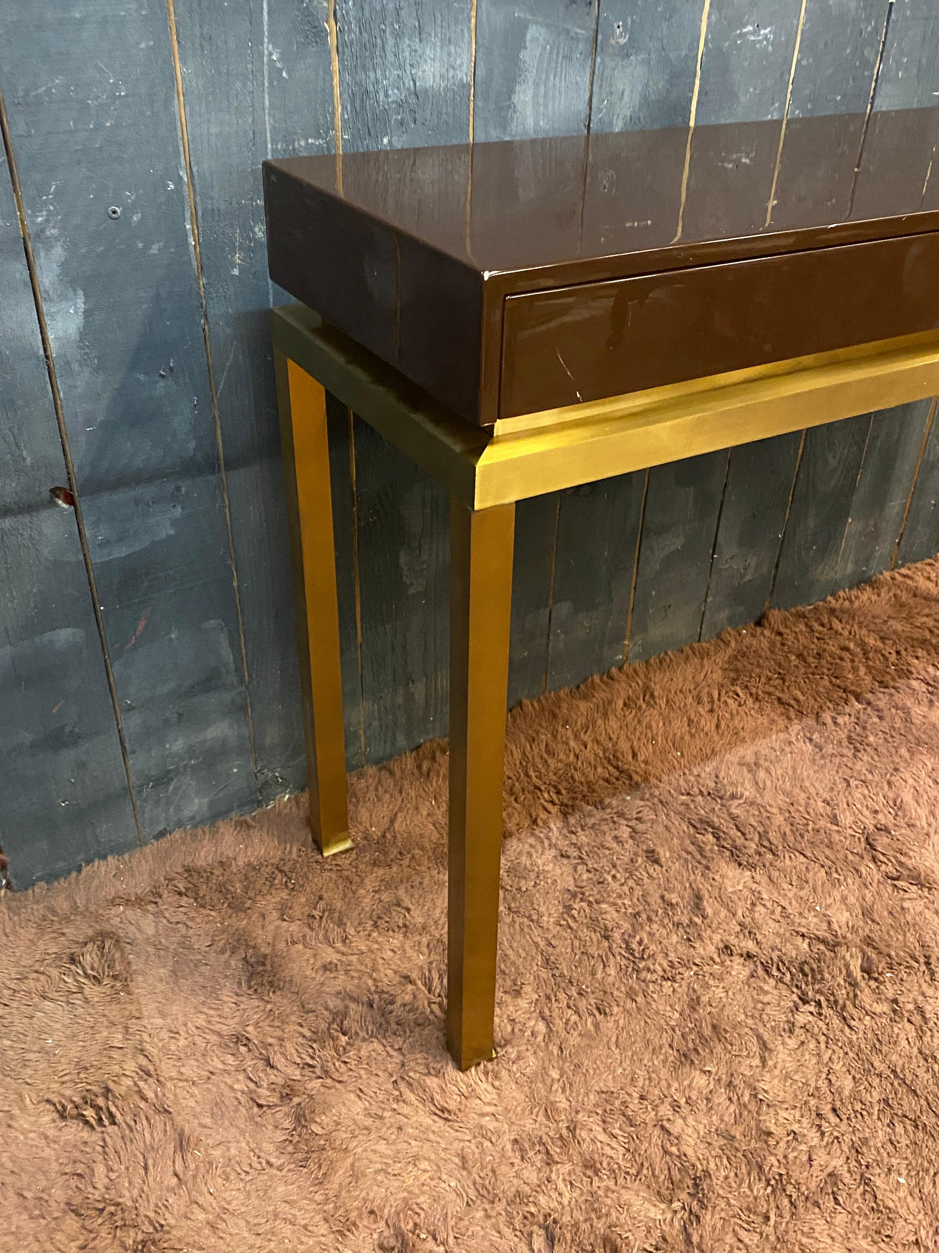 Lacquered Guy Lefevre, elegant console in lacquered wood and brass, circa 1970 For Sale