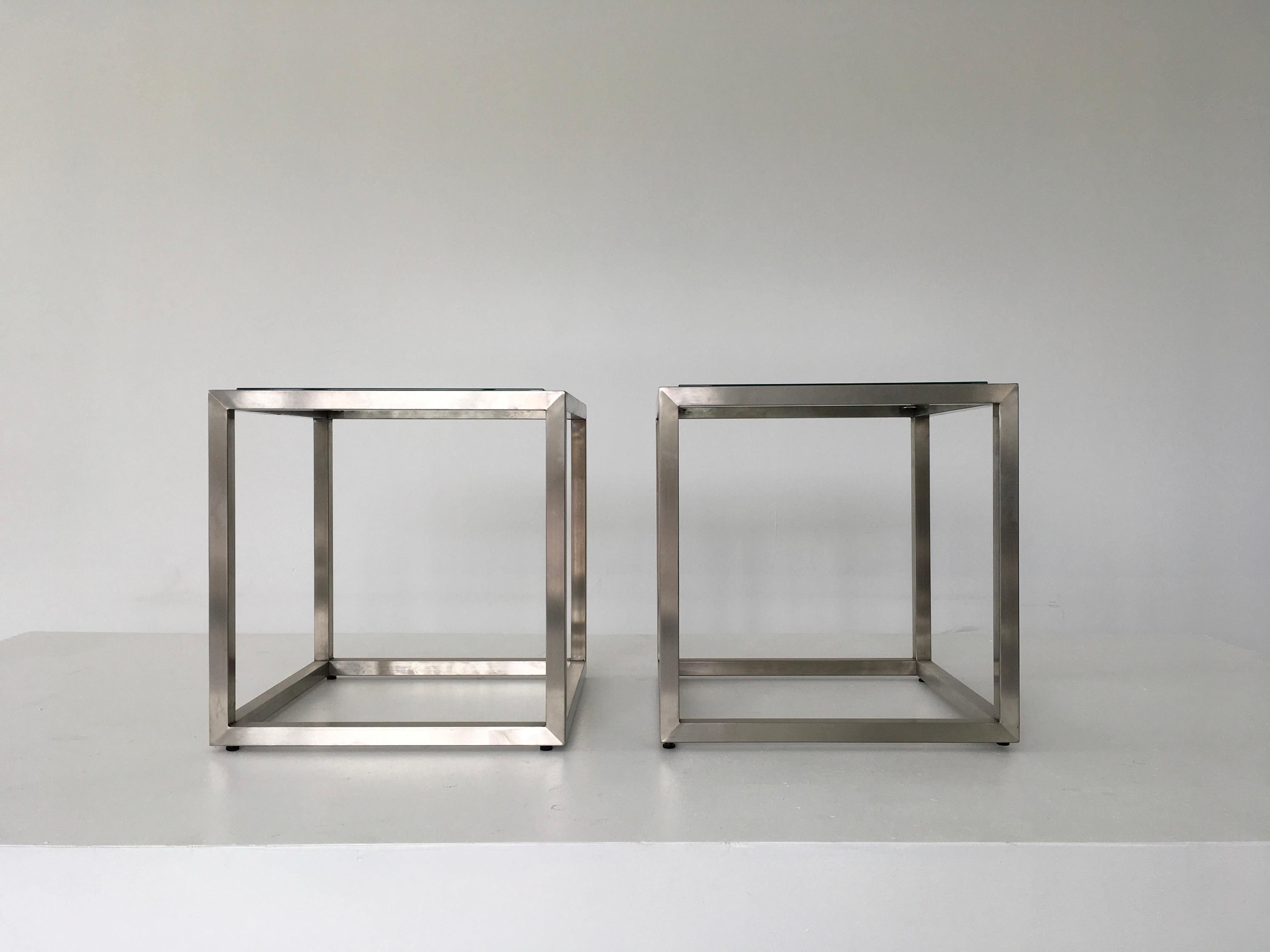 Minimalism at its best, Guy Lefevre stainless cube side tables.