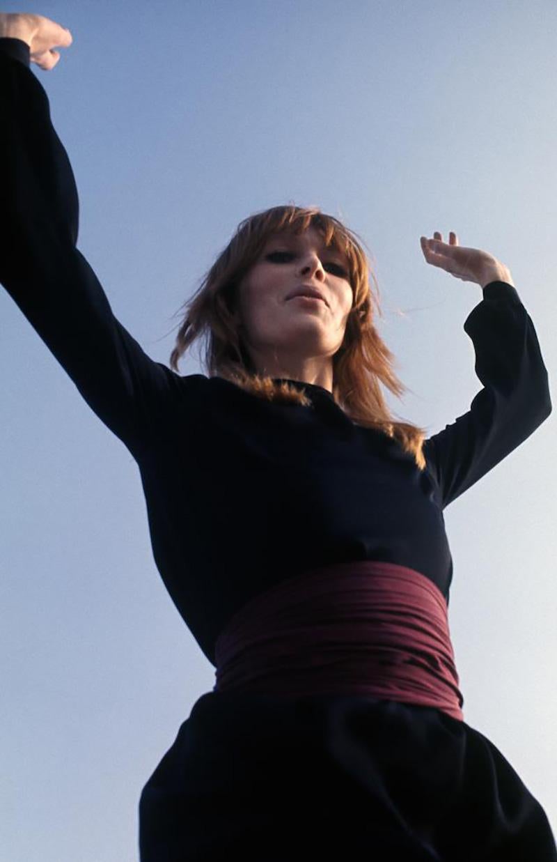 Guy Webster Color Photograph - Nico Dancing