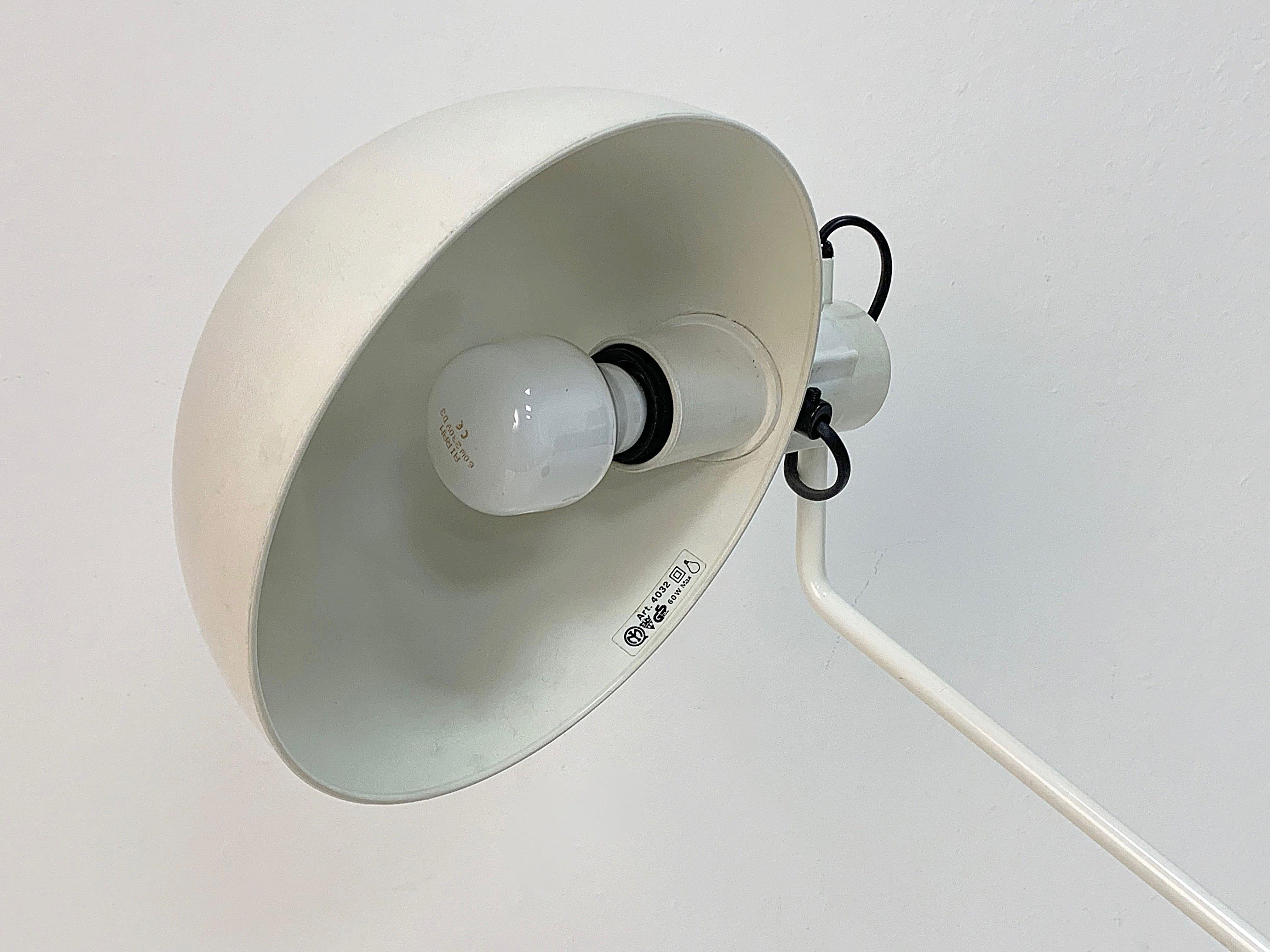 Italian Guzzini, Adjustable Desk Lamp, White and Black Table Lamp, Italy, 1970s For Sale