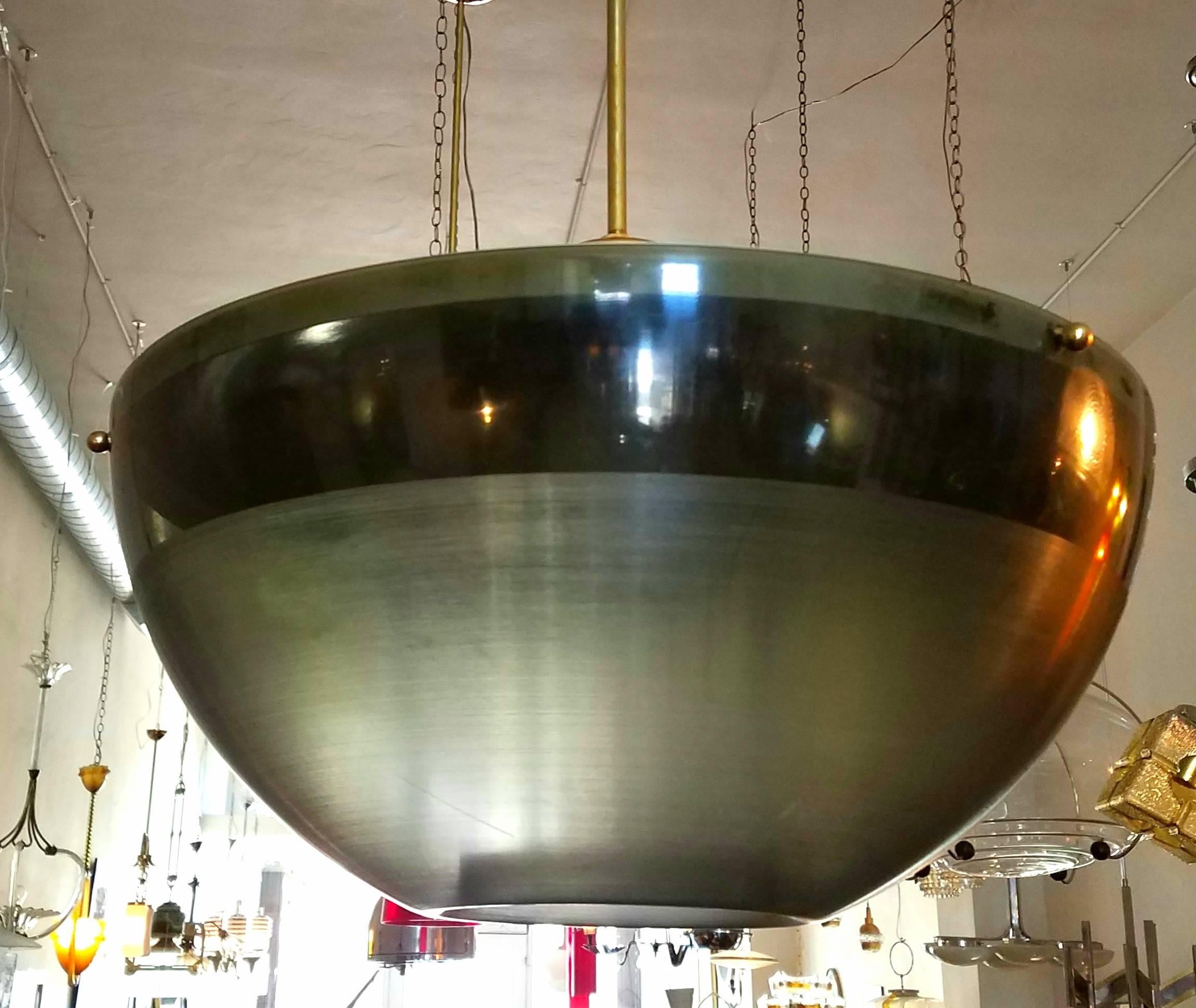 Italian 1970s pair of Guzzini for Meblo pendants. Acrylic shade metal and brass base. The pair of chandeliers are in very good condition Acrylic shades have some minor scratches .
Shipping standard parcel  $245.