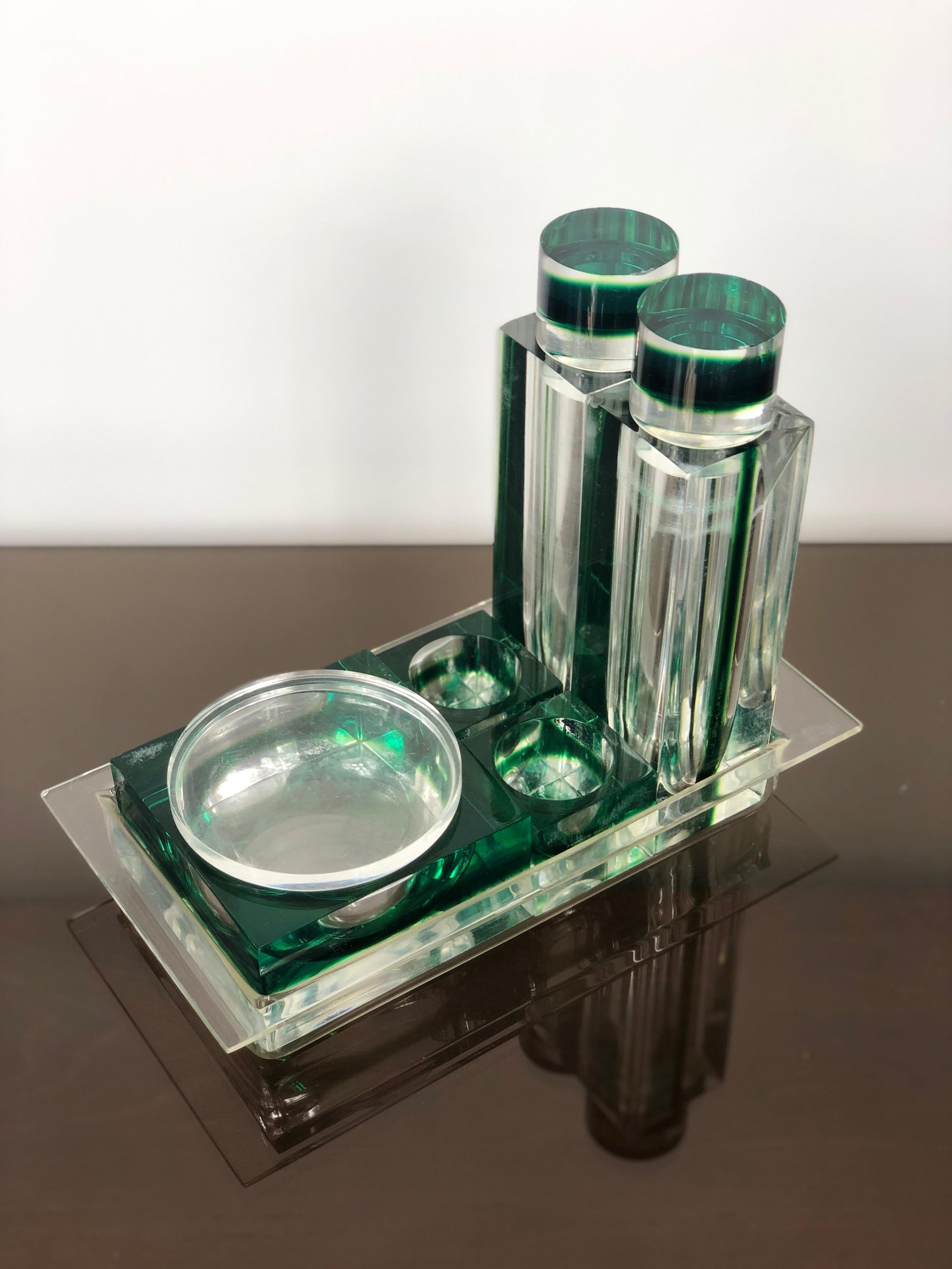 Table set for pepper, salt, parmesan etc. in green Lucite made by Guzzini, Italy, 1970s.