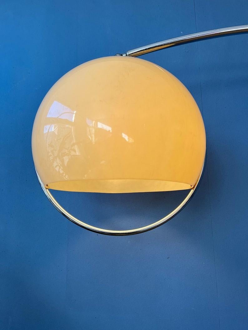 Very rare Italian space age arc floor lamp with beige shade attributed to Guzzini. The acrylic glass mushroom shade produces a delicate, warm glow. The lamp has a heavy marble base. The height/length of the lamp can be adjusted with its extendable