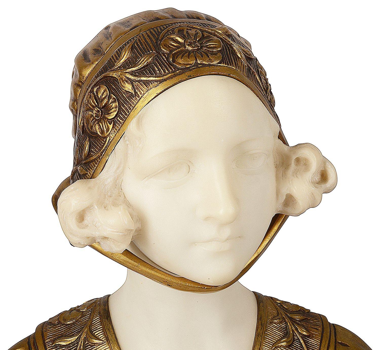 An enchanting late 19th, early 20th century marble and gilded ormolu bust depicting a pretty young Dutch maiden.
Signed; G.V. Vaerenbergh.
Gustave Van Vaerenbergh (1873 - 1927) was active/lived in Belgium. Gustave Van Vaerenbergh is known for