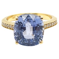 Anello cocktail con zaffiro blu NTE e diamante certificato GWL in oro giallo 18 carati