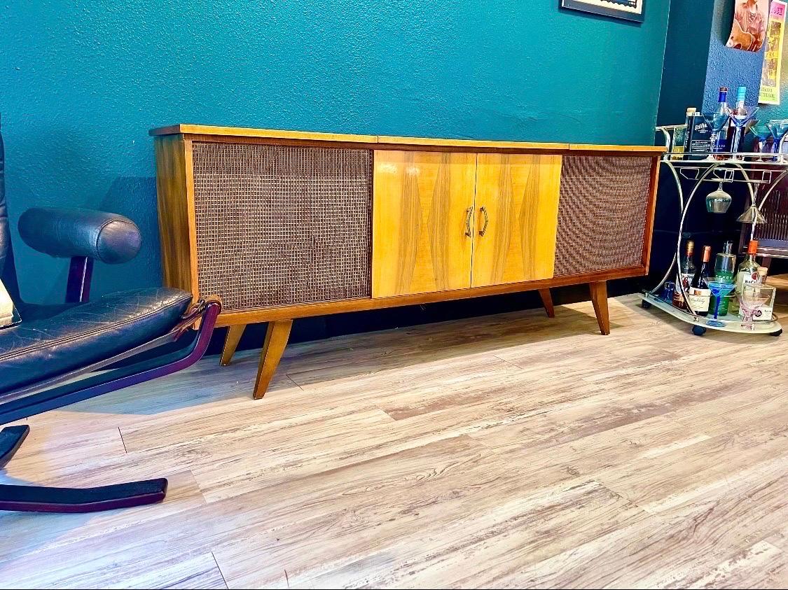 Thanks for looking at this mid century stereo console.

(Jan 9, 2024:  Pricing updated for customer who wants to include: record player, vintage radio receiver, working CRT TV.  Adjusted timeline and shipping options)

This is a German Delmonico