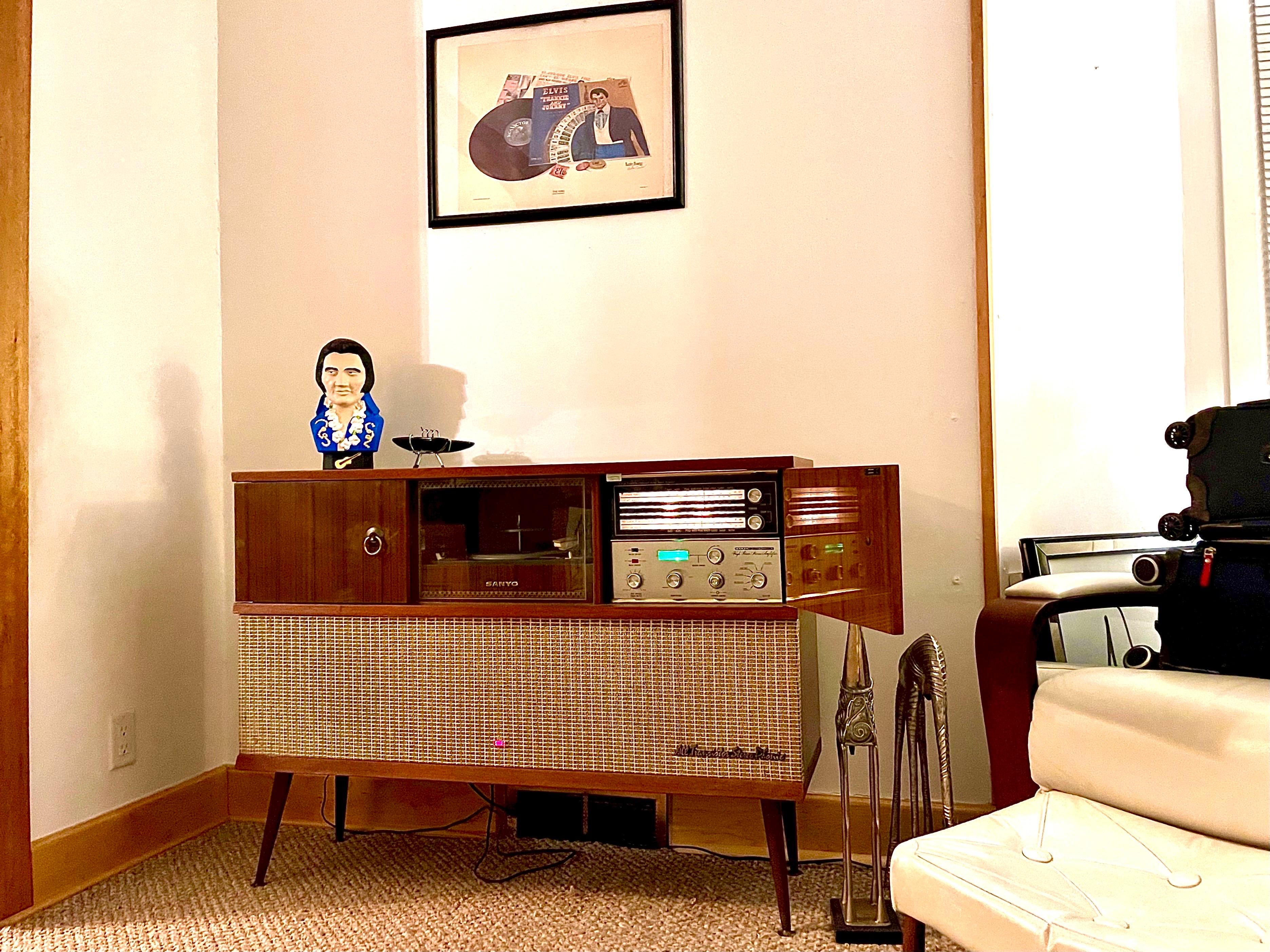 Thanks for looking at this refurbished, fully functioning midcentury stereo console.

This is a cherished and much respected Sanyo cabinet. It shows great time period patina but refinished to a great looking piece. The tubeset receiver is left