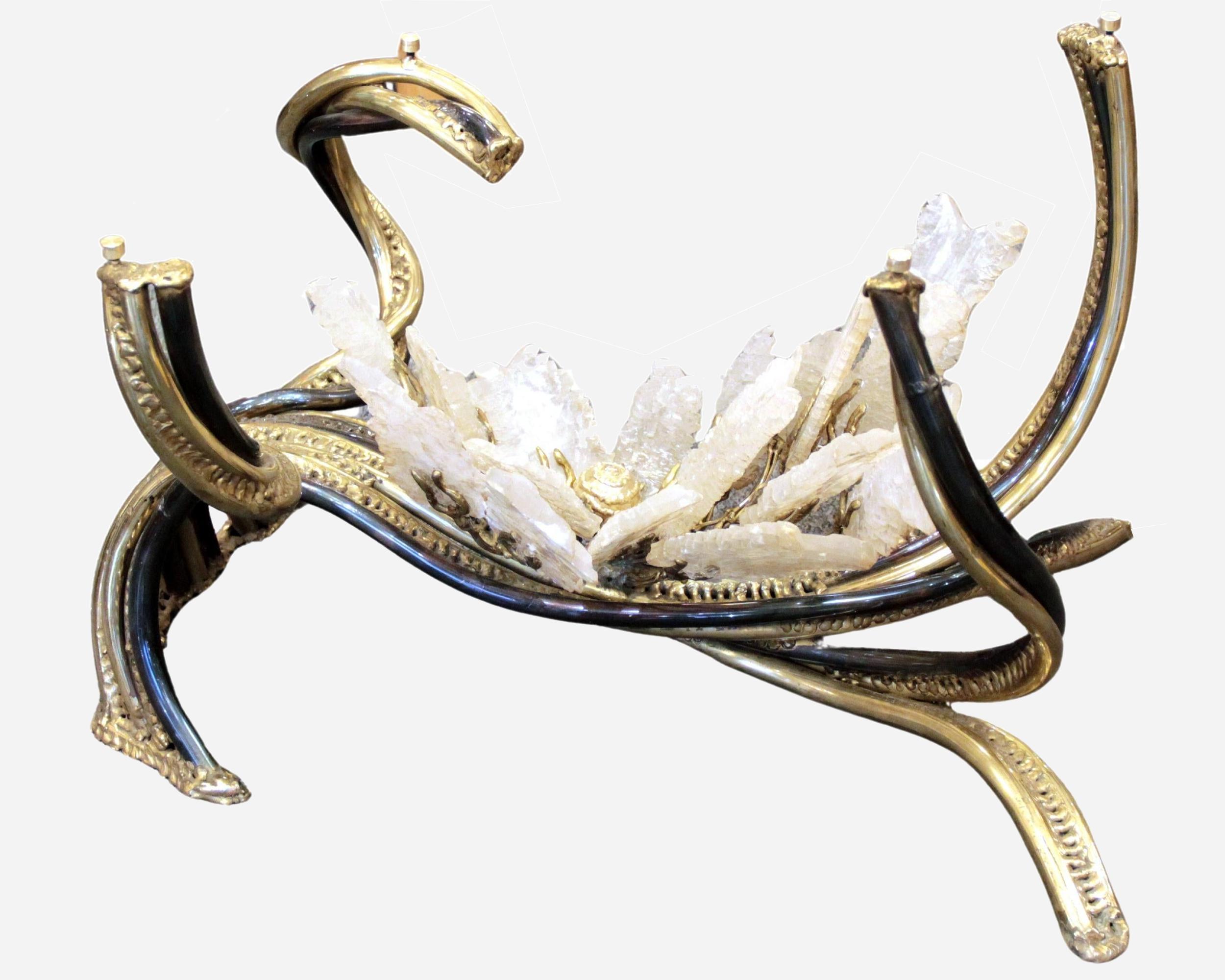 Coffee table in polished and patinated brass, with fine brass brazing and a bouquet of gypsum arrows in the middle. Unique hand-crafted piece.

Biography

An artistic metal sculptor, Richard Faure has created numerous decorative objects by hand, all