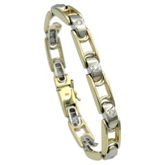 Pulsera de eslabones bicolor con diamantes redondos engastados en oro pulido de 14 quilates