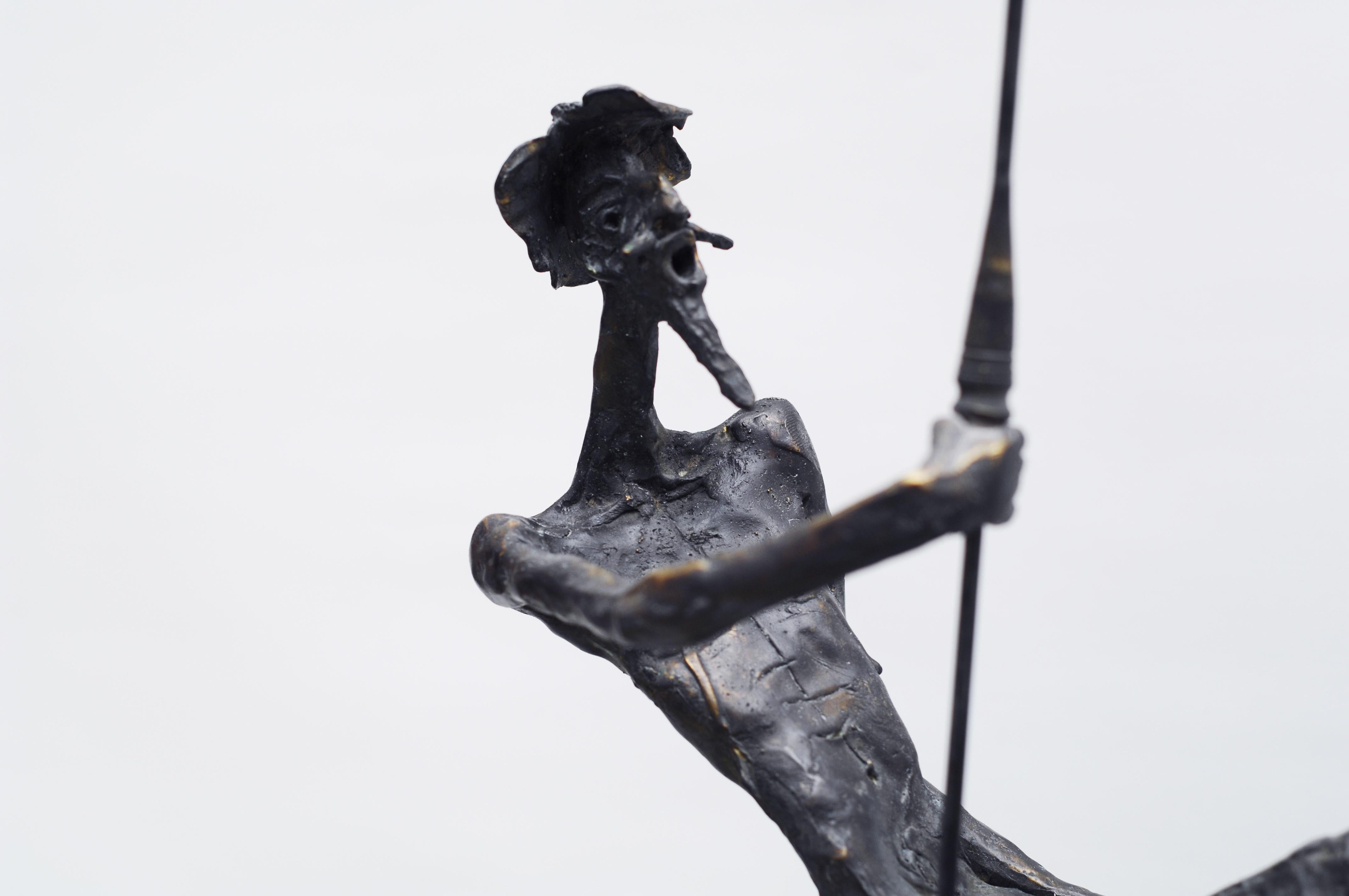 Sculpture Don Quixote (on horseback, holding spear); Unique original work, handcrafted, carved, chiseled, patinated, polished, and mounted on a pedestal by the artist. 

Artist statement: 