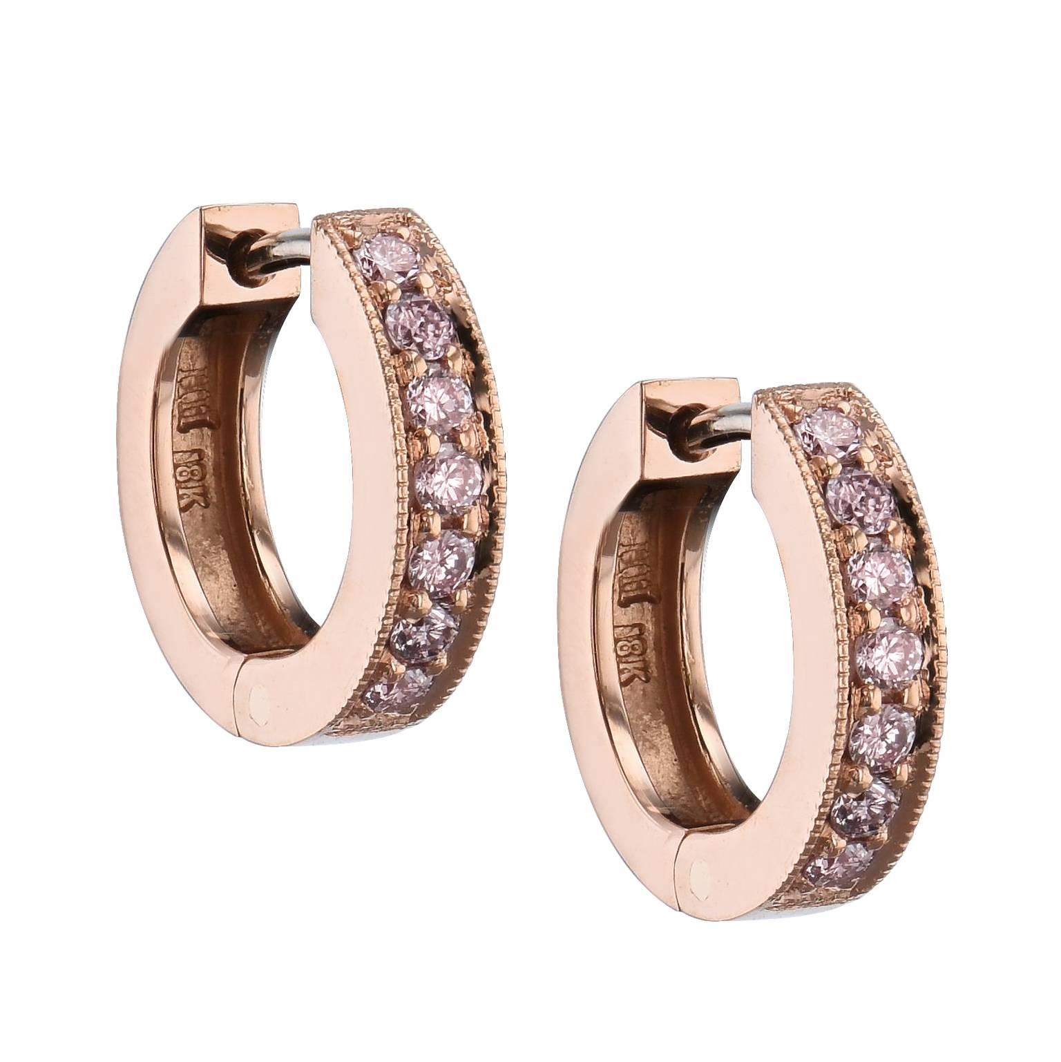 18 karat rose gold act as a backdrop to a beautiful sea of 0.29 carat of pink diamond pave set with milgrain work (SI1/SI2) in these handmade H and H classic hinged hoop earrings.