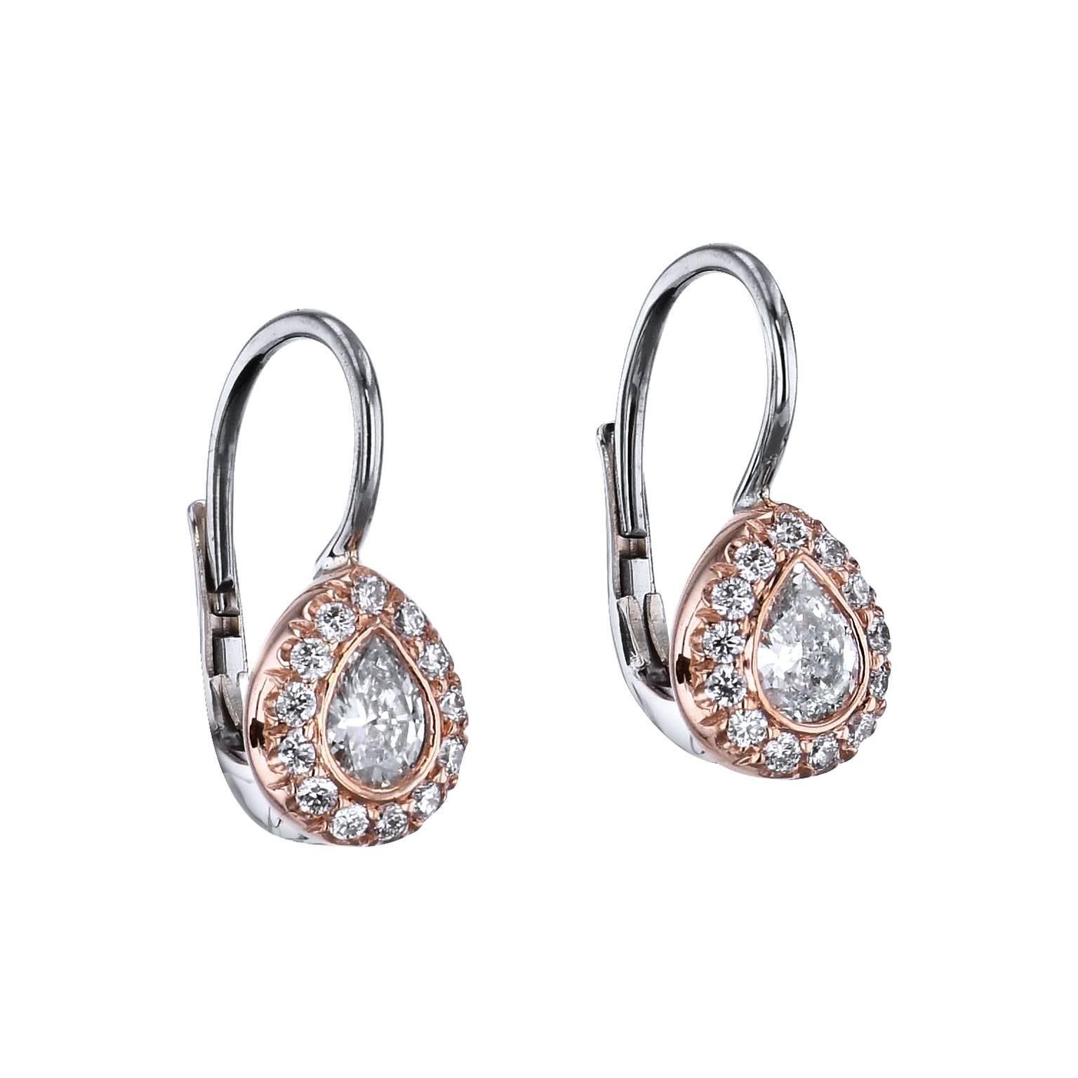 0.31 Carat Pear-Shaped Diamond Lever-Back Earrings 18 karat White and Rose Gold 

These are one of a kind and handmade by H&H Jewels.  

Two pear-shaped diamonds, with a total weight of 0.31 carat (F/G/VS2) hang with poise; while twenty-six pave-set