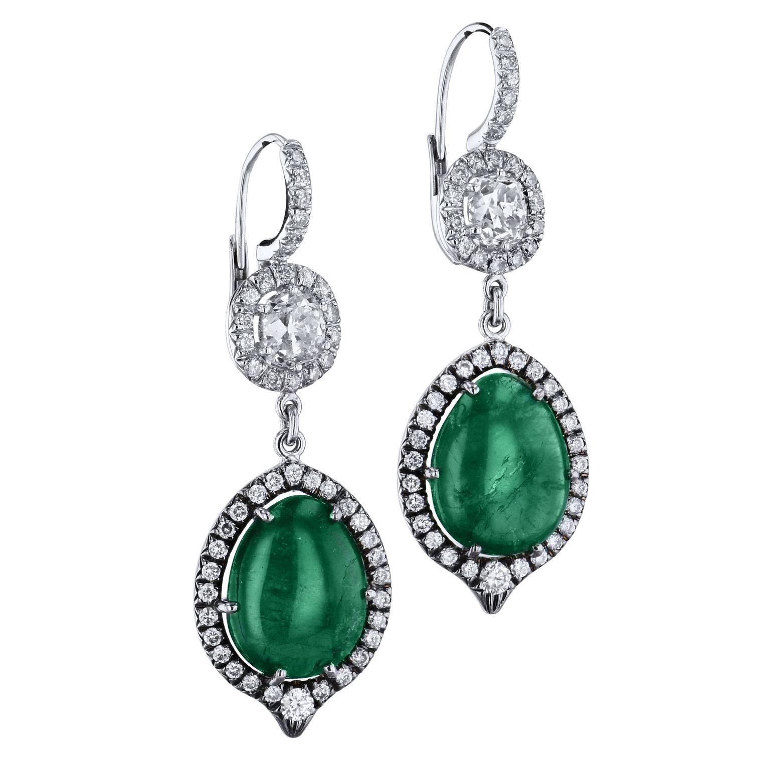 15.64 Carat Zambian Tear Drop Emerald and 1.05 carat of Diamond Earrings 18 kt

These stunning earrings are one of a kind and handmade by H&H Jewels. 

Like two deep green oases, 15.64 carat of teardrop cabochon Zambian emerald are prong-set below