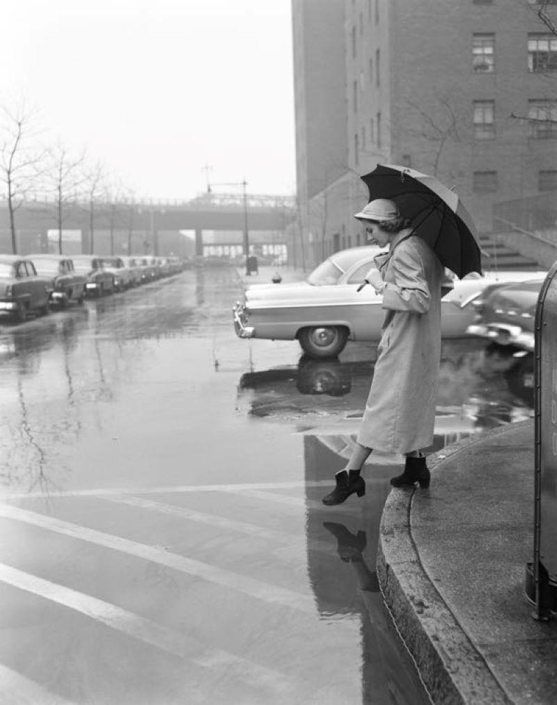 H. Armstrong Roberts Figurative Photograph - 'Woman in a Rain Coat' Silver Gelatin Fibre Print - Oversized 