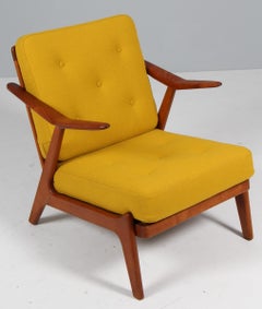 H. Brockman Petersen lounge chair of teak and oak. Yellow Hallingdal wool