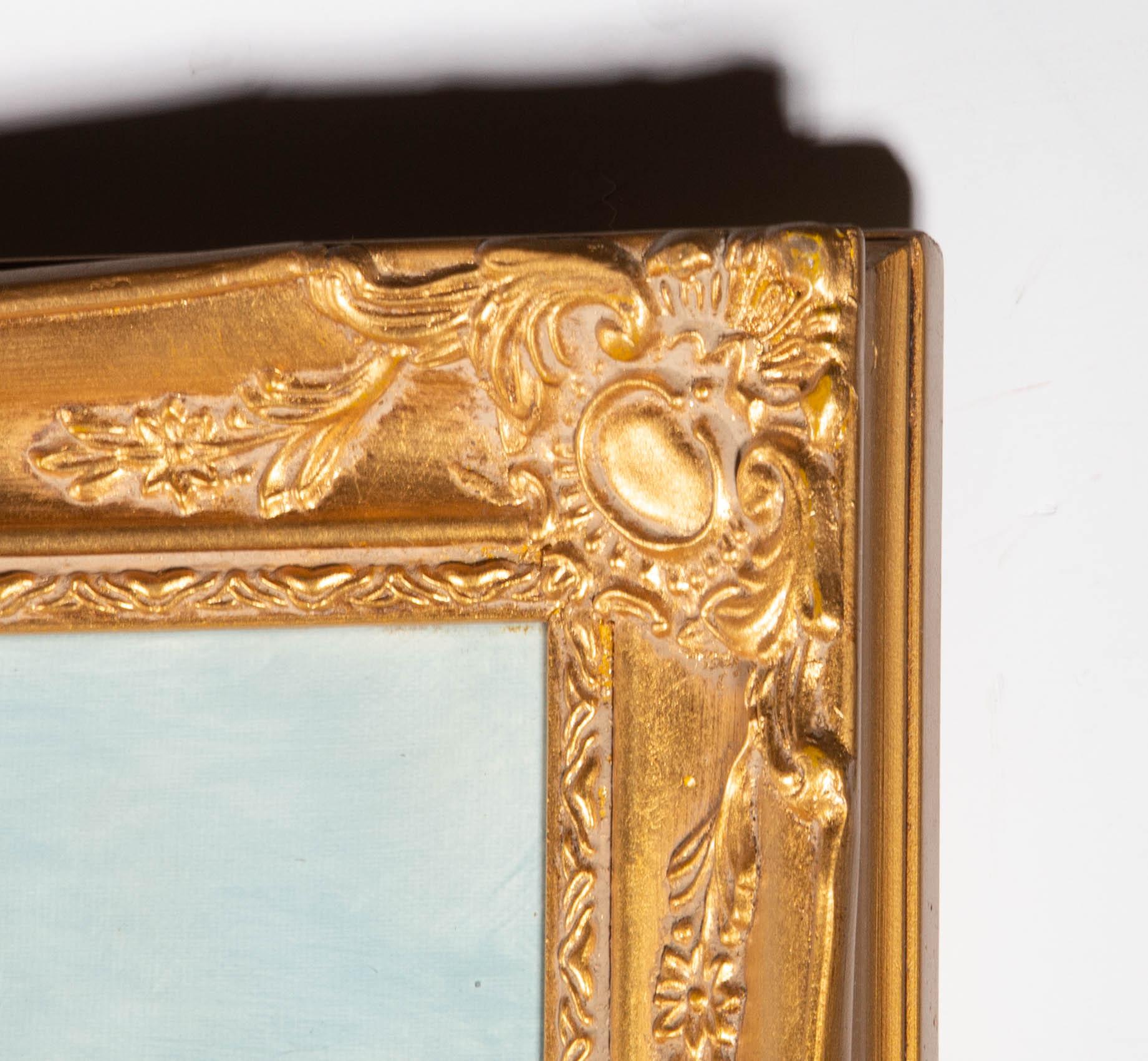 A vibrant and attractive oil painting, depicting a rural landscape scene with a small cottage by a river. Signed to the lower right-hand corner. Presented in an ornate, gilt effect frame. On canvas on stretchers.
