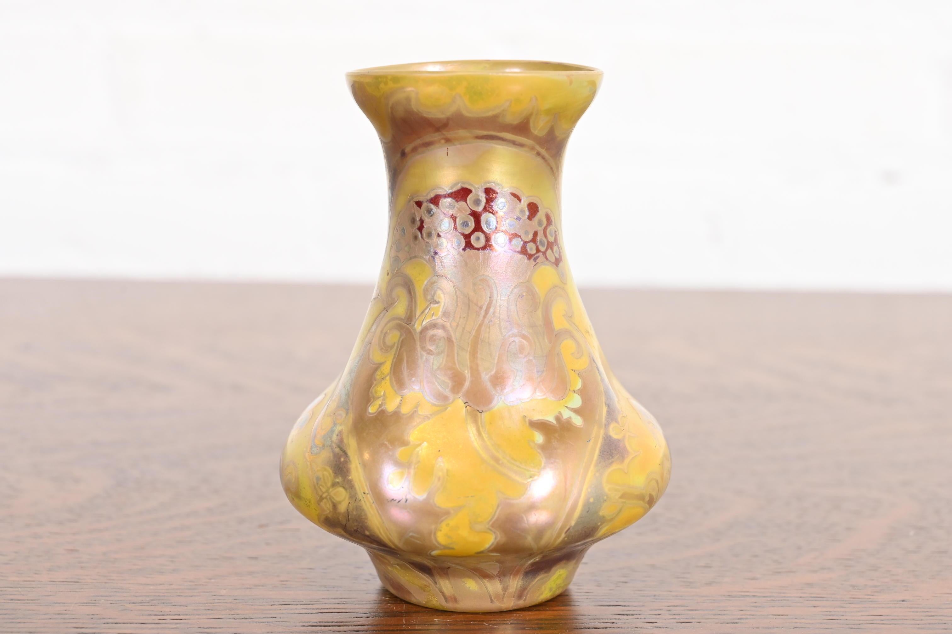 A gorgeous antique Art Nouveau iridescent art glass bud vase

By H. Copillet Et Cie (signed to the underside)

France, Circa 1900

Measures: 4